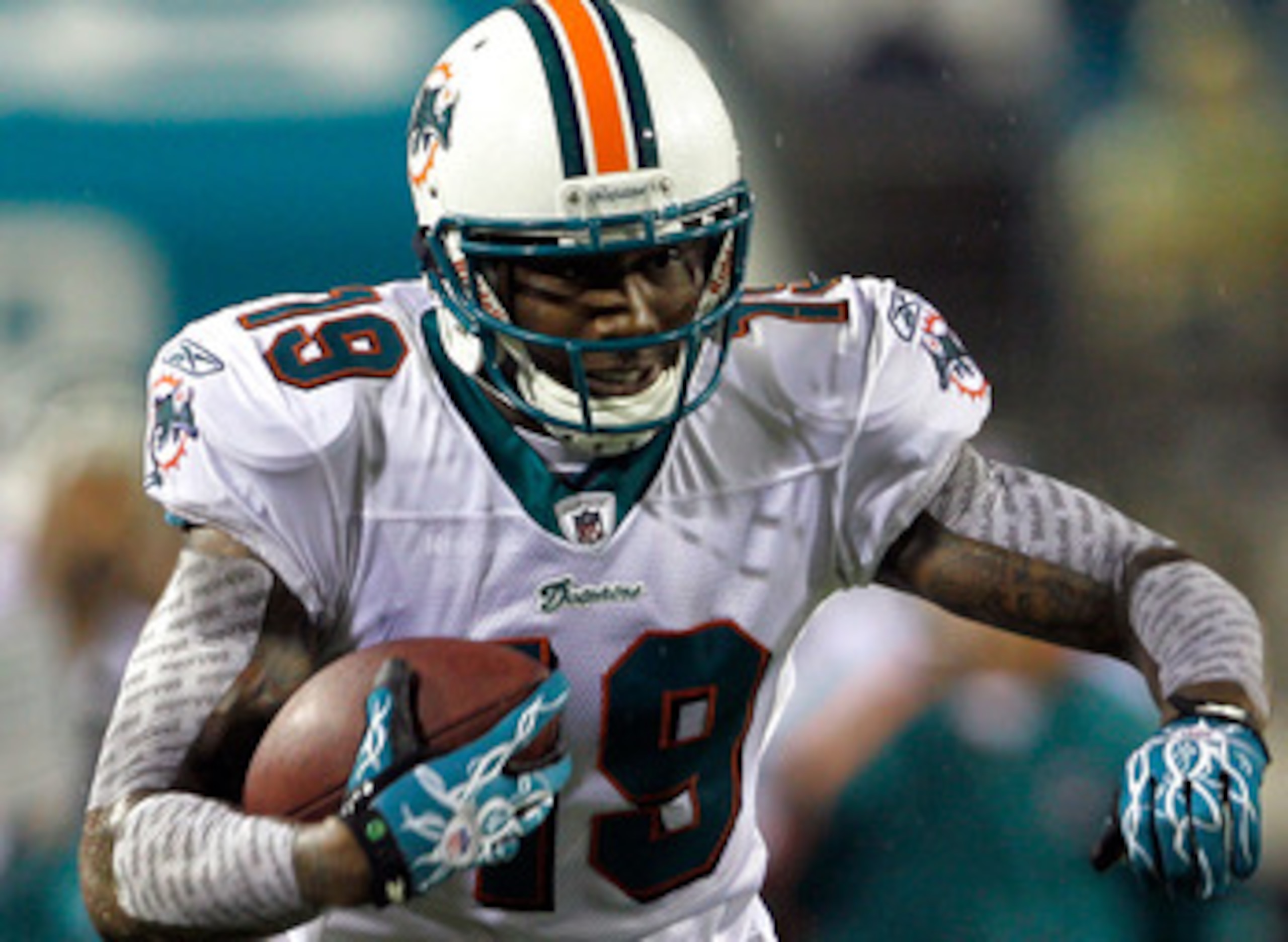 JACKSONVILLE, FL - AUGUST 21:  Brandon Marshall #19 of the Miami Dolphins runs after making a reception during the preseason game against the Jacksonville Jaguars at EverBank Field on August 21, 2010 in Jacksonville, Florida.  (Photo by Sam Greenwood/Gett