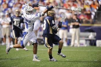 BALTIMORE, MD - MAY 31: Kelly McKenna #13 of the Notre Dame Fighting Irish tries to get by CJ Costabile #9 of the Duke Blue Devils during the 2010 NCAA Division 1 Lacrosse Championship game on May 31, 2010 at M&T Bank Stadium in Baltimore, Maryland. (Ph BALTIMORE, MD - MAY 31: Kelly McKenna #13 of the Notre Dame Fighting Irish tries to get by CJ Costabile #9 of the Duke Blue Devils during the 2010 NCAA Division 1 Lacrosse Championship game on May 31, 2010 at M&T Bank Stadium in Baltimore, Maryland. (Ph