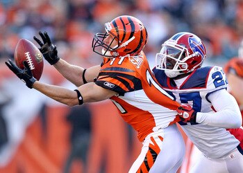 CINCINNATI - NOVEMBER 21:  Jordan Shipley #11 of the Cincinnati Bengals reaches for a pas while defended by Reggie Corner #27 of the Buffalo Bills during the NFL game  at Paul Brown Stadium on November 21, 2010 in Cincinnati, Ohio.  The Bills won 49-31.  