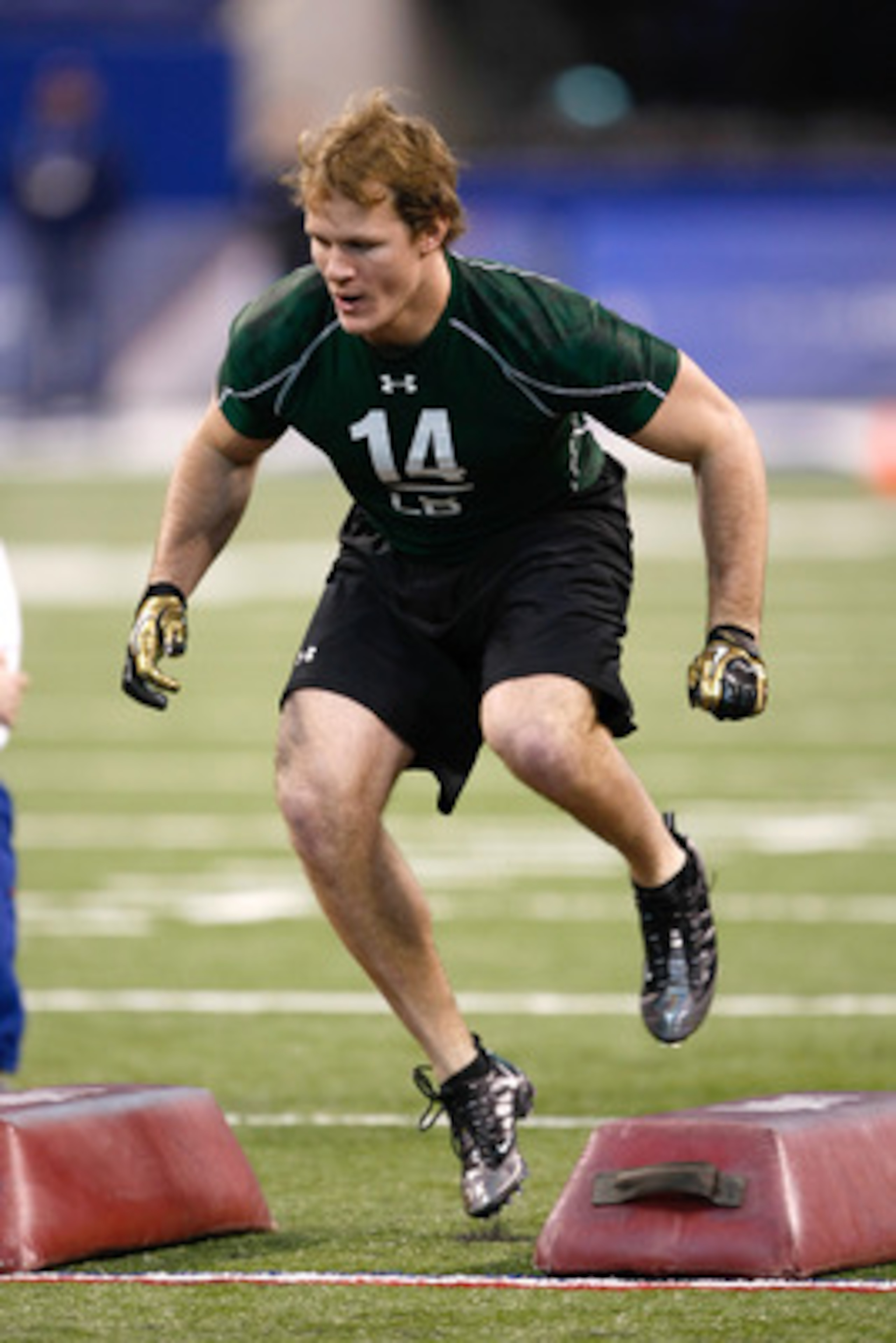INDIANAPOLIS, IN - MARCH 1: Linebacker A.J. Edds of Iowa runs in practice drills during the NFL Scouting Combine presented by Under Armour at Lucas Oil Stadium on March 1, 2010 in Indianapolis, Indiana. (Photo by Scott Boehm/Getty Images)