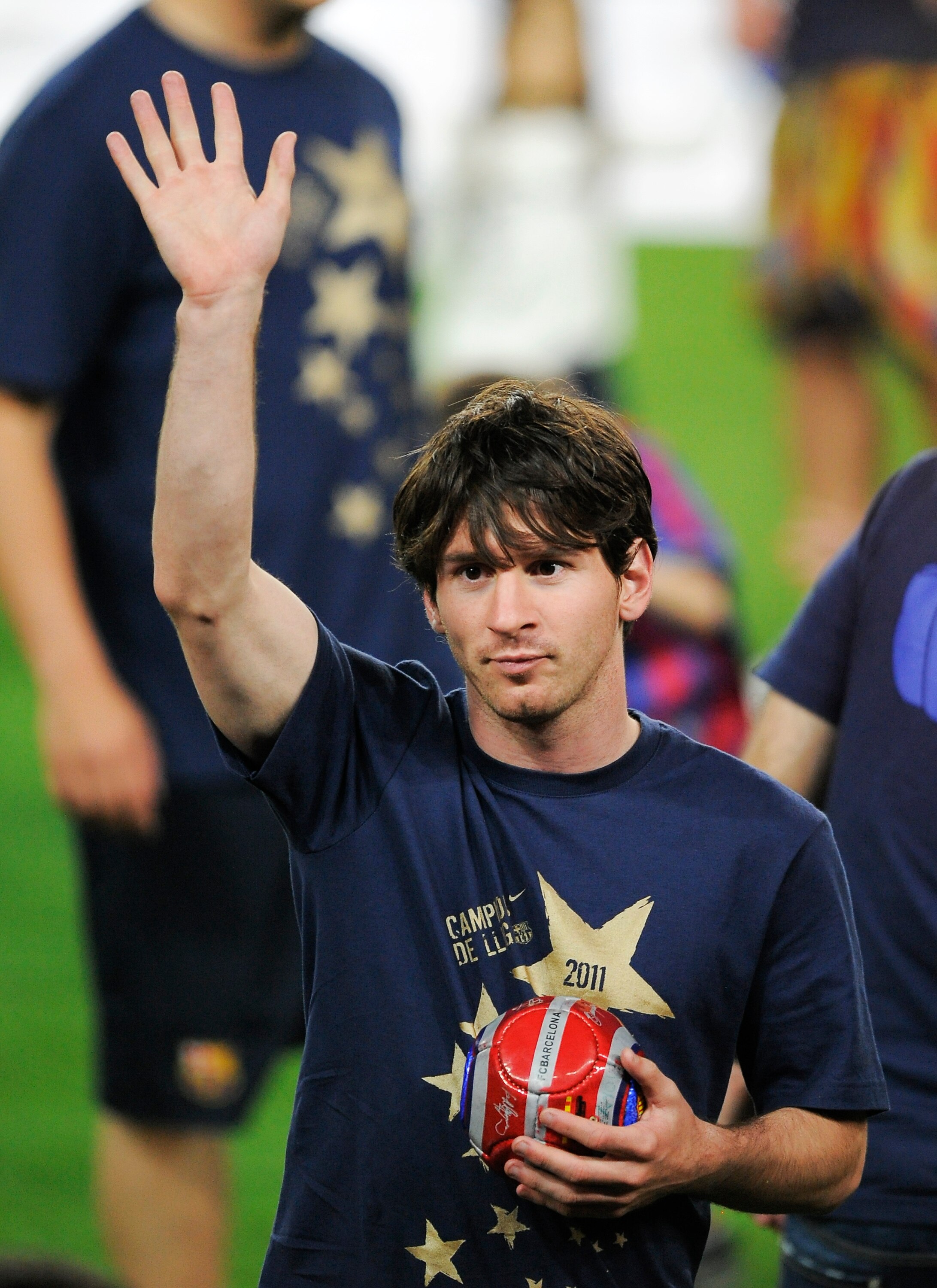 BARCELONA, SPAIN - MAY 13:  Lionel Messi of FC Barcelona celebrates during the celebrations for winning the Spanish Liga at the Camp Nou Stadium on May 13, 2011 in Barcelona, Spain.  (Photo by David Ramos/Getty Images)