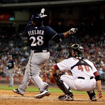 HOUSTON - APRIL 30:  Prince Fielder #28 of the Milwaukee Brewers and catcher J.R. Towels #46 of the Houston Astros watch the ball leave the park in the ninth inning as he hits a home run to right field to tie the game against the Houston Astros at Minute