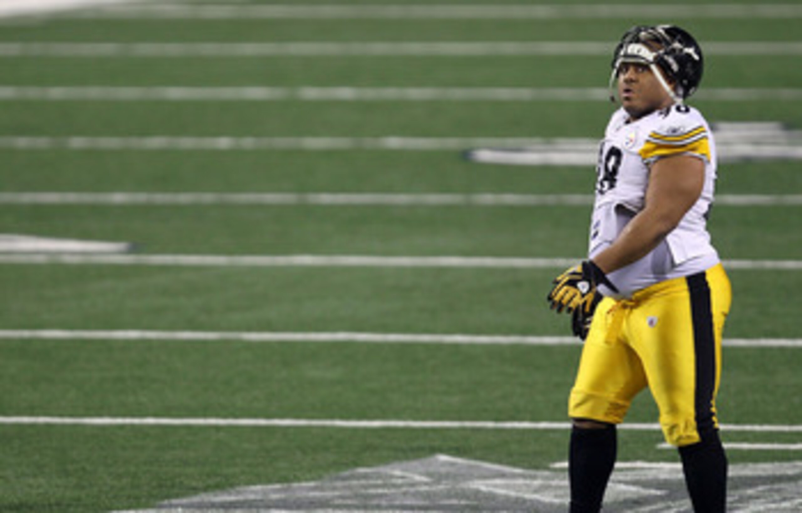 ARLINGTON, TX - FEBRUARY 06: Casey Hampton #98 of the Pittsburgh Steelers walks off the field after a play during the first half of Super Bowl XLV at Cowboys Stadium on February 6, 2011 in Arlington, Texas.  (Photo by Mike Ehrmann/Getty Images)