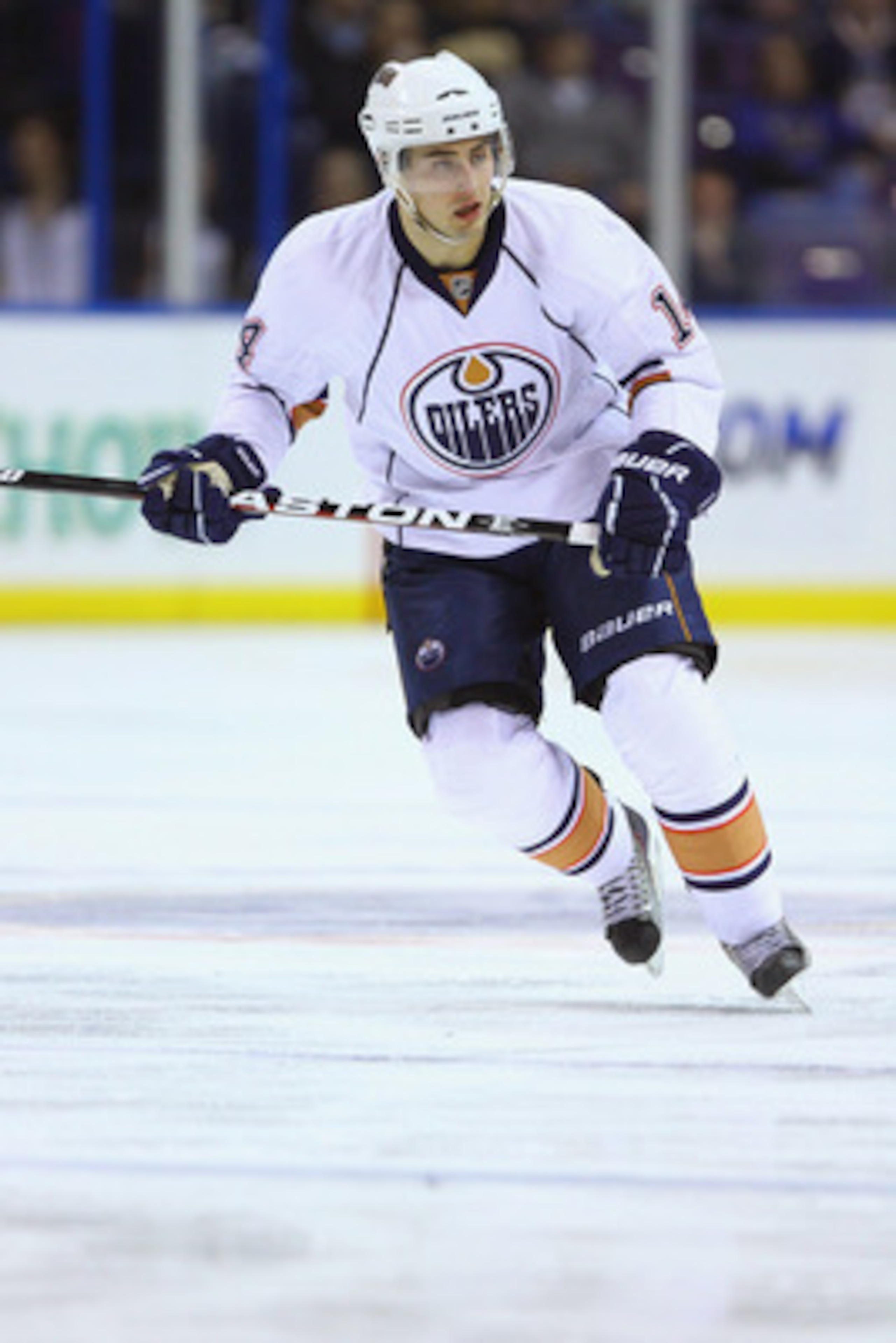 ST. LOUIS, MO - FEBRUARY 4: Jordan Eberle #14 of the Edmonton Oilers in action against the St. Louis Blues at the Scottrade Center on February 4, 2011 in St. Louis, Missouri. The Blues won 5-3. (Photo by Dilip Vishwanat/Getty Images)