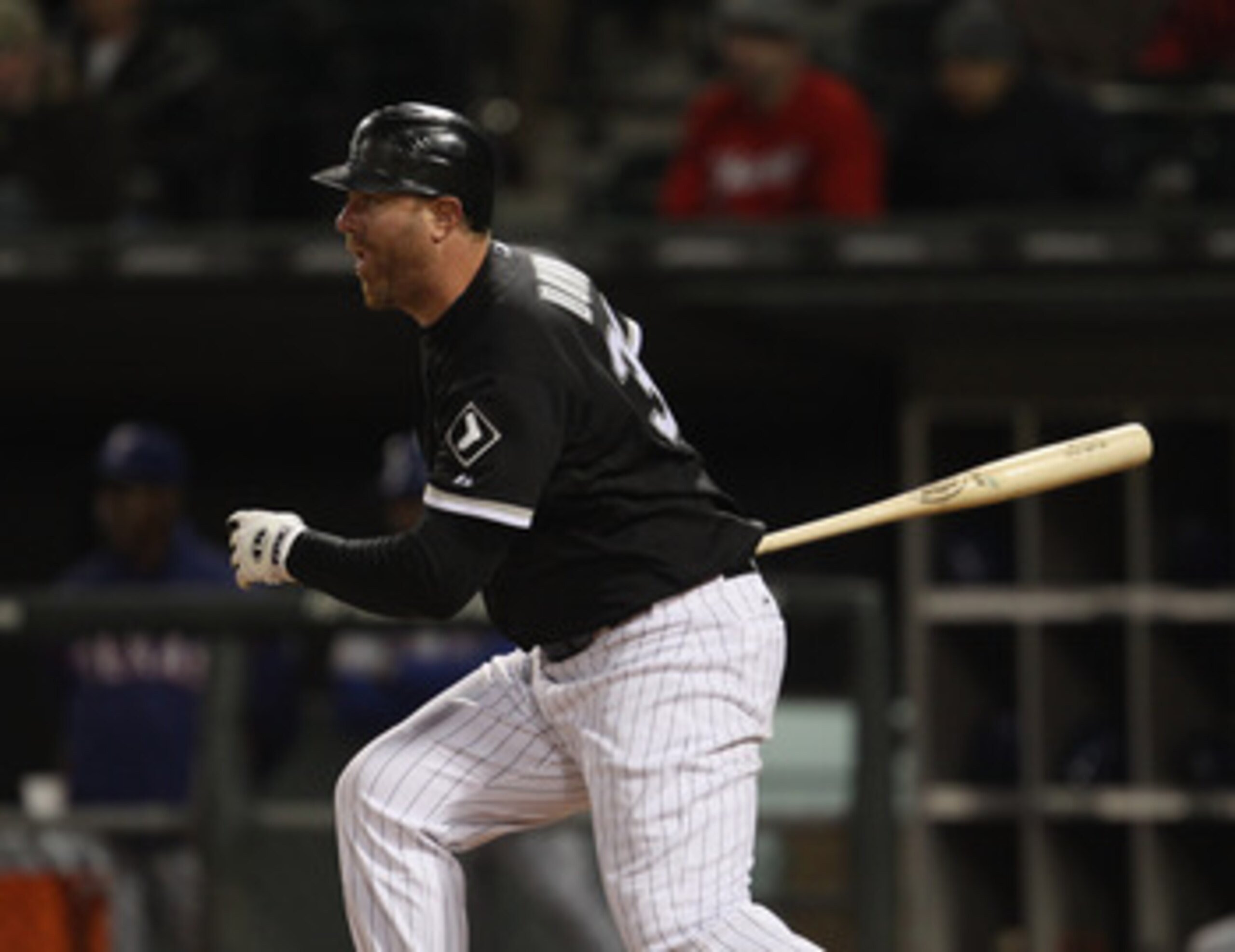 CHICAGO, IL - MAY 16: Adam Dunn #32 of the Chicago White Sox hits the ball against the Texas Rangers at U.S. Cellular Field on May 16, 2011 in Chicago, Illinois. The Rangers defeated the White Sox 4-0. (Photo by Jonathan Daniel/Getty Images)