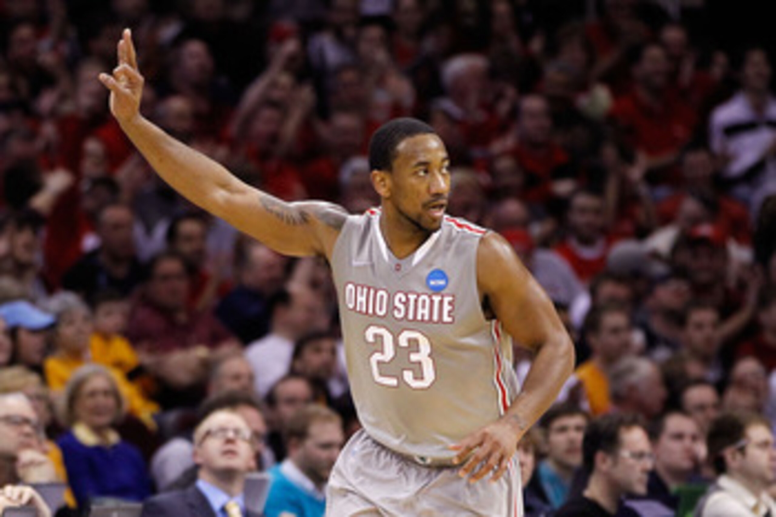 CLEVELAND, OH - MARCH 20: David Lighty #23 of the Ohio State Buckeyes gestures after making a three point basket against the George Mason Patriots during the third of the 2011 NCAA men's basketball tournament at Quicken Loans Arena on March 20, 2011 in Cl