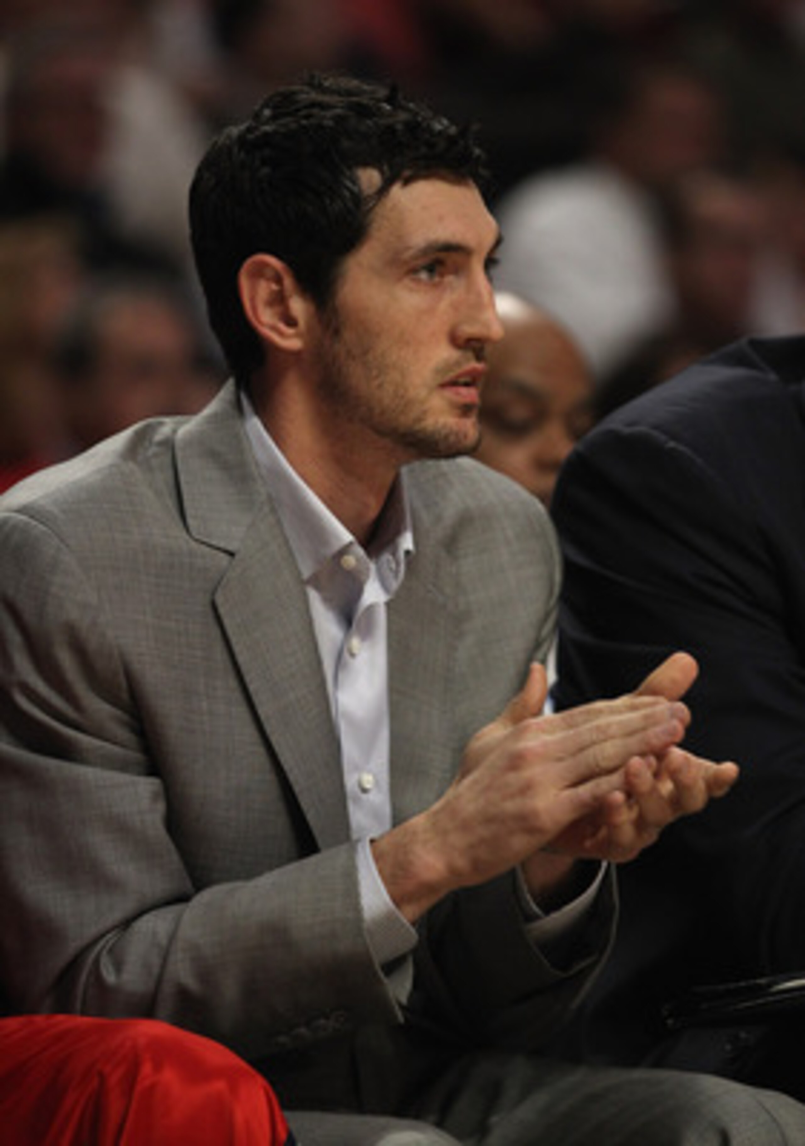 CHICAGO, IL - MAY 02: Injured player Kirk Hinrich of the Atlanta Hawks cheers on his team from the bench against the Chicago Bulls in Game One of the Eastern Conference Semifinals in the 2011 NBA Playoffs at the United Center on May 2, 2011 in Chicago, Il
