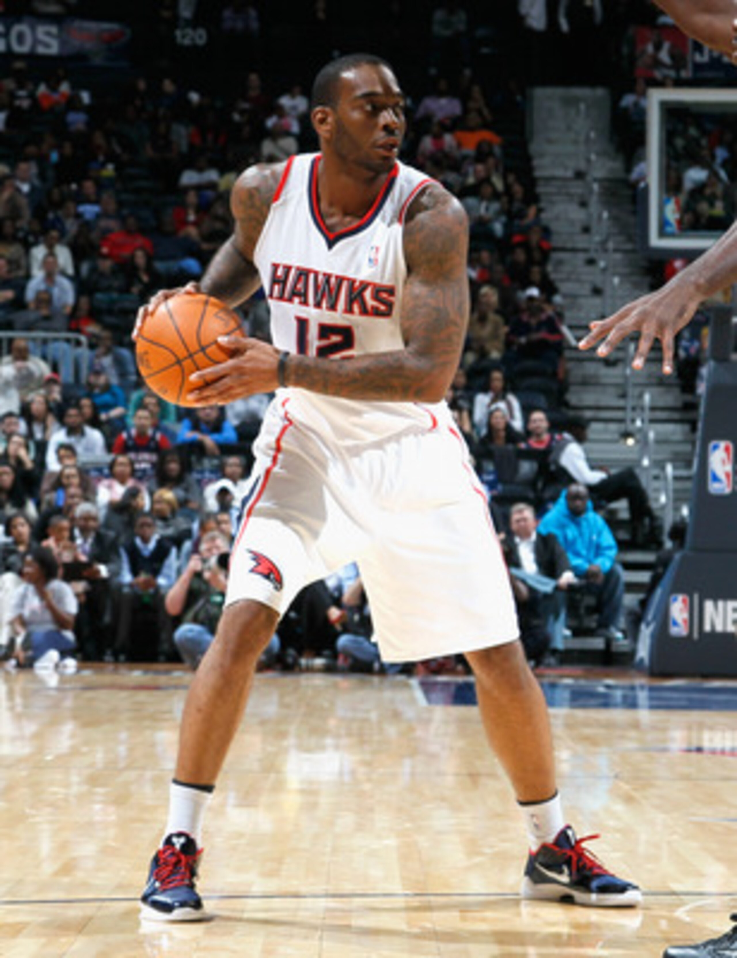 ATLANTA - NOVEMBER 12:  Josh Powell #12 of the Atlanta Hawks against the Utah Jazz at Philips Arena on November 12, 2010 in Atlanta, Georgia.  NOTE TO USER: User expressly acknowledges and agrees that, by downloading and/or using this Photograph, User is