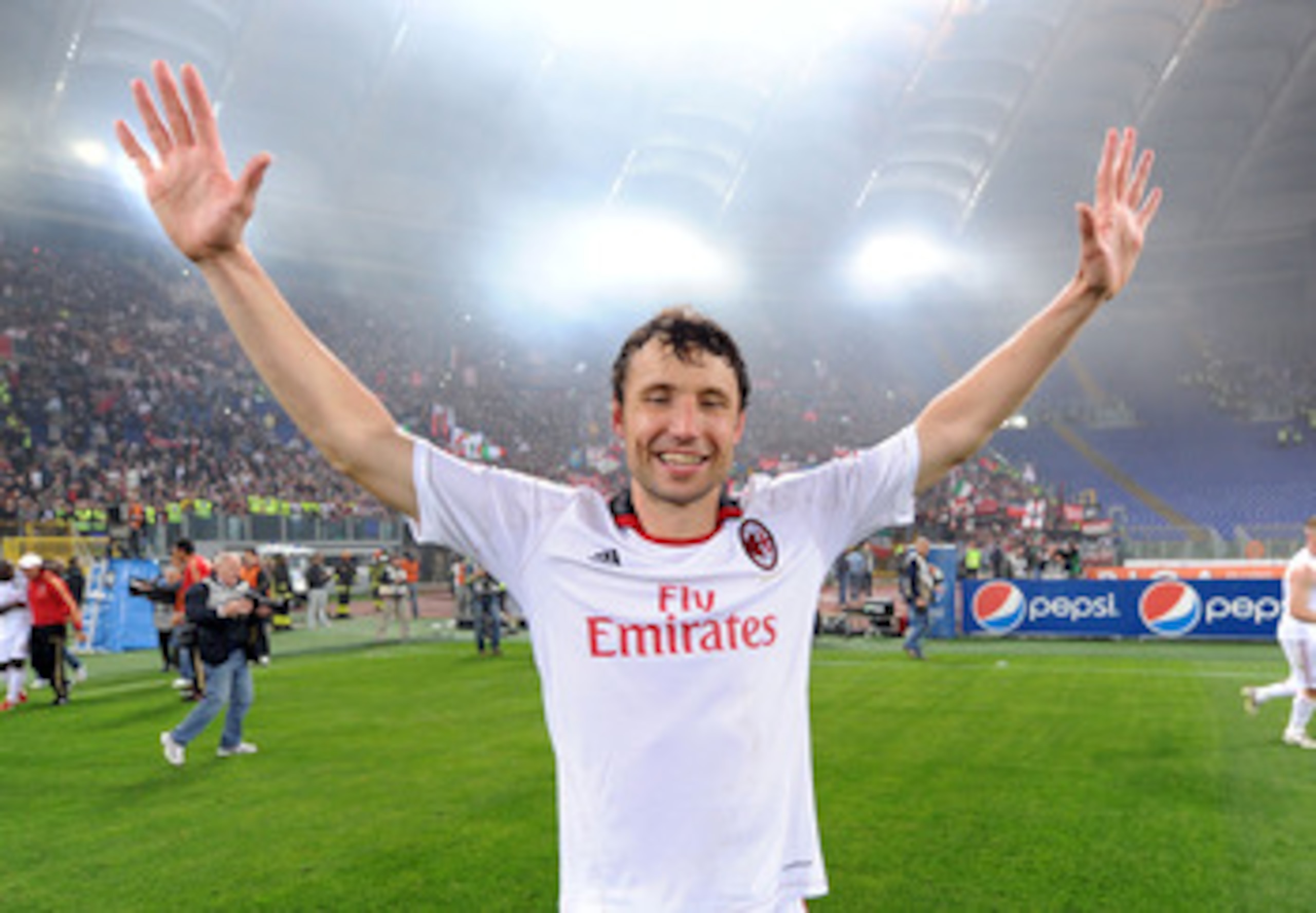 ROME, ITALY - MAY 07:  Mark Van Bommel of Milan celebrates the victory after the Serie A match between AS Roma and AC Milan at Stadio Olimpico on May 7, 2011 in Rome, Italy.  (Photo by Giuseppe Bellini/Getty Images)