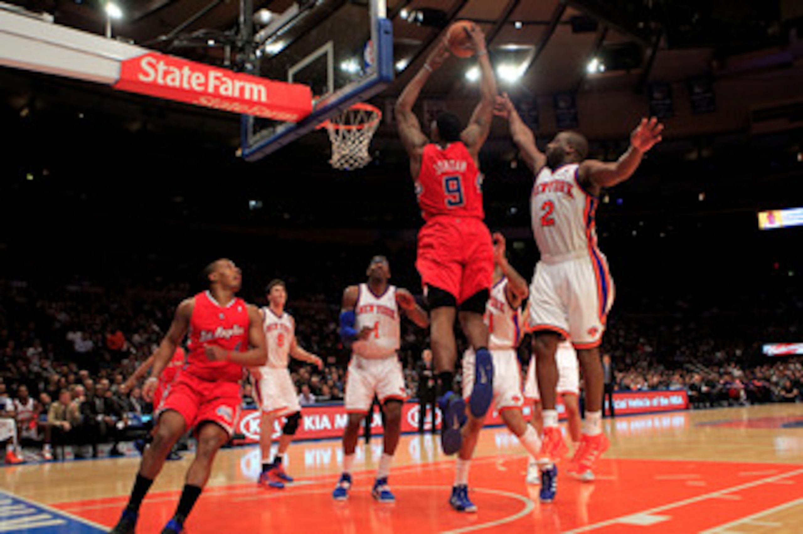 NEW YORK, NY - FEBRUARY 09:  DeAndre Jordan #9 of the Los Angeles Clippers shoots over Raymond Felton #2 of the New York Knicks at Madison Square Garden on February 9, 2011 in New York City. NOTE TO USER: User expressly acknowledges and agrees that, by do