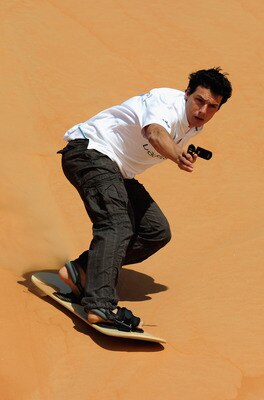 ABU DHABI, UNITED ARAB EMIRATES - FEBRUARY 05:  Taig Khris during the Laureus Sandboarding Experience as part of the 2011 Laureus World Sports Awards in the Liwa Desert, Rub Al Khali (Empty Quarter) on February 5, 2011 in Abu Dhabi, United Arab Emirates. 