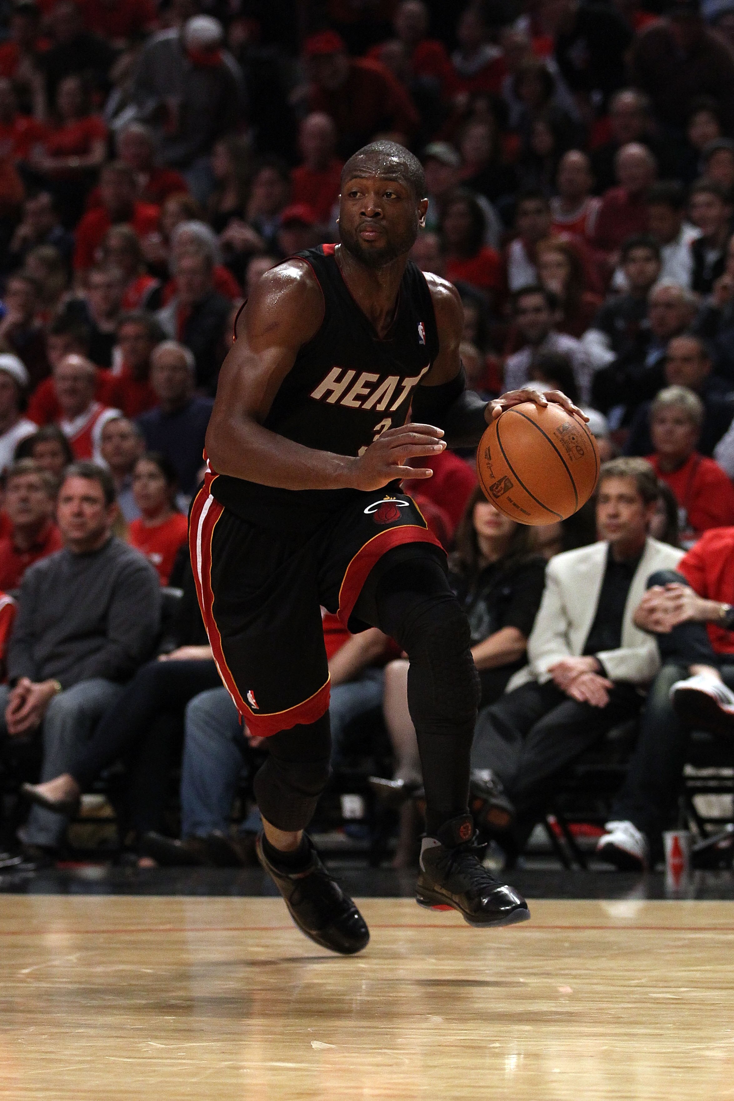 CHICAGO, IL - MAY 15:  Dwyane Wade #3 of the Miami Heat drives against the Chicago Bulls in Game One of the Eastern Conference Finals during the 2011 NBA Playoffs on May 15, 2011 at the United Center in Chicago, Illinois. NOTE TO USER: User expressly ackn