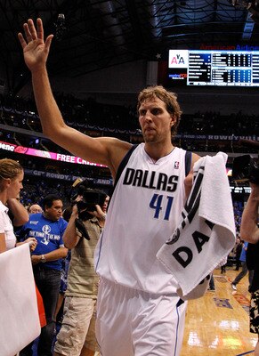 DALLAS, TX - MAY 17:  Dirk Nowitzki #41 of the Dallas Mavericks celebrates as he walks off the court after the Mavericks defeated the Oklahoma City Thunder 121-112 in Game One of the Western Conference Finals during the 2011 NBA Playoffs at American Airli