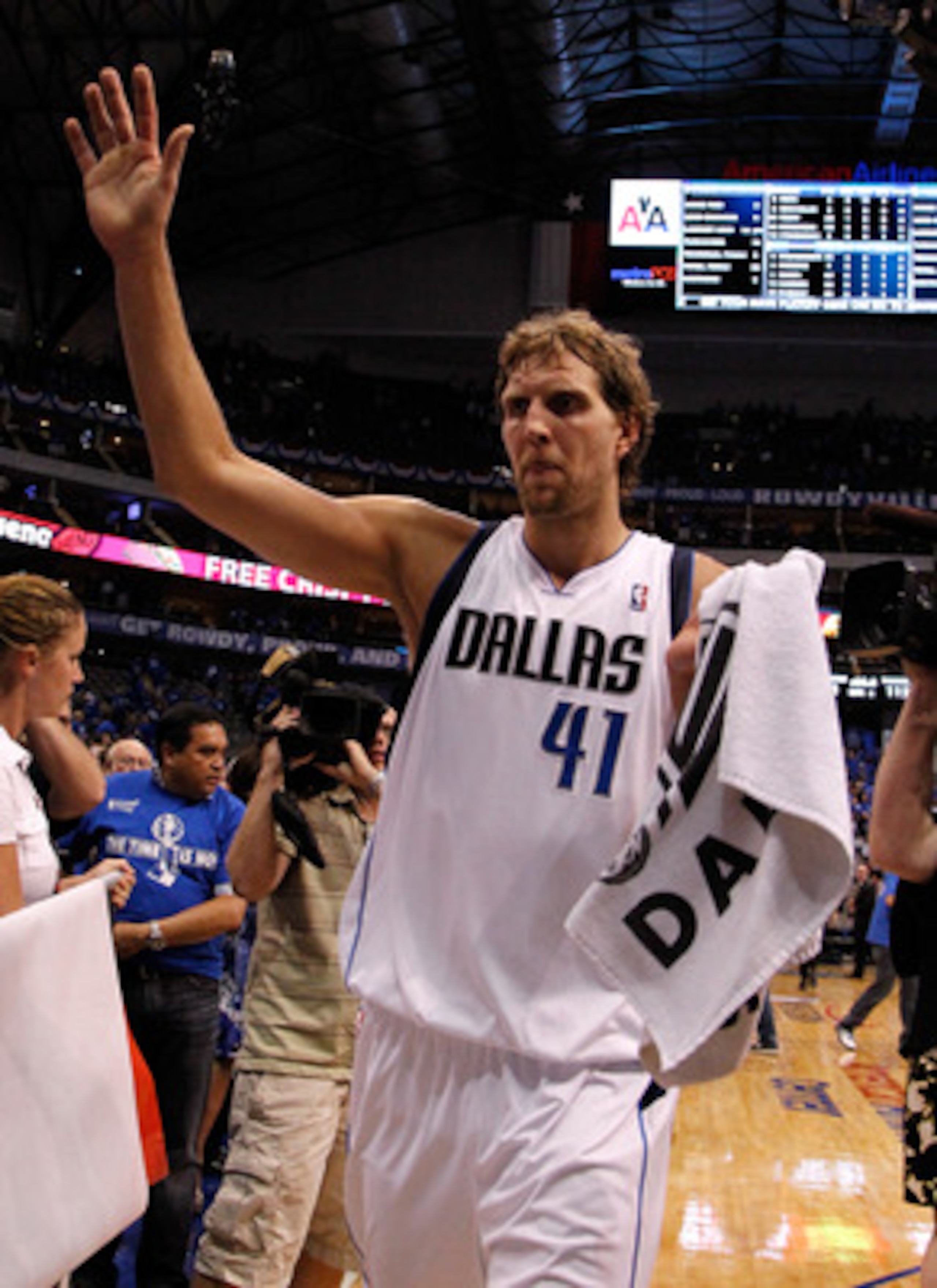DALLAS, TX - MAY 17:  Dirk Nowitzki #41 of the Dallas Mavericks celebrates as he walks off the court after the Mavericks defeated the Oklahoma City Thunder 121-112 in Game One of the Western Conference Finals during the 2011 NBA Playoffs at American Airli