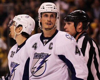 BOSTON, MA - MAY 17:  Vincent Lecavalier #4 of the Tampa Bay Lightning looks on in Game Two of the Eastern Conference Finals against the Boston Bruins during the 2011 NHL Stanley Cup Playoffs at TD Garden on May 17, 2011 in Boston, Massachusetts.  (Photo 