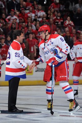 WASHINGTON, DC - FEBRUARY 01:  Former Washington Capital Dino Ciccarelli shakes hands with Alex Ovechkin #8 of the Washington Capitals before the game against the Montreal Canadiens at the Verizon Center on February 1, 2011 in Washington, DC.  (Photo by G
