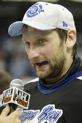 TAMPA, FL - JUNE 7:  Nikolai Khabibulin #35 of the Tampa Bay Lightning is interviewed after the victory over the Calgary Flames in Game seven of the NHL Stanley Cup Finals on June 7, 2004 at the St. Pete Times Forum in Tampa, Florida.  The Lightning defea