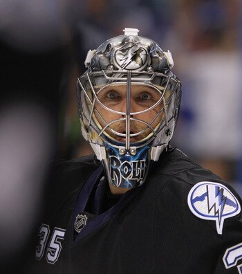 TAMPA, FL - MAY 03: Dwayne Roloson #35 of the Tampa Bay Lightning keeps his eyes on the action in his game against the Washington Capitals in Game Three of the Eastern Conference Semifinals during the 2011 NHL Stanley Cup Playoffs at St Pete Times Forum o