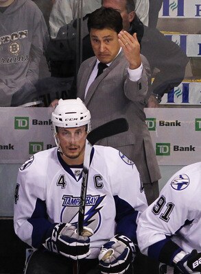 BOSTON, MA - MAY 17:  Head coach Guy Boucher of the Tampa Bay Lightning reacts in Game Two of the Eastern Conference Finals against the Boston Bruins during the 2011 NHL Stanley Cup Playoffs at TD Garden on May 17, 2011 in Boston, Massachusetts.  (Photo b