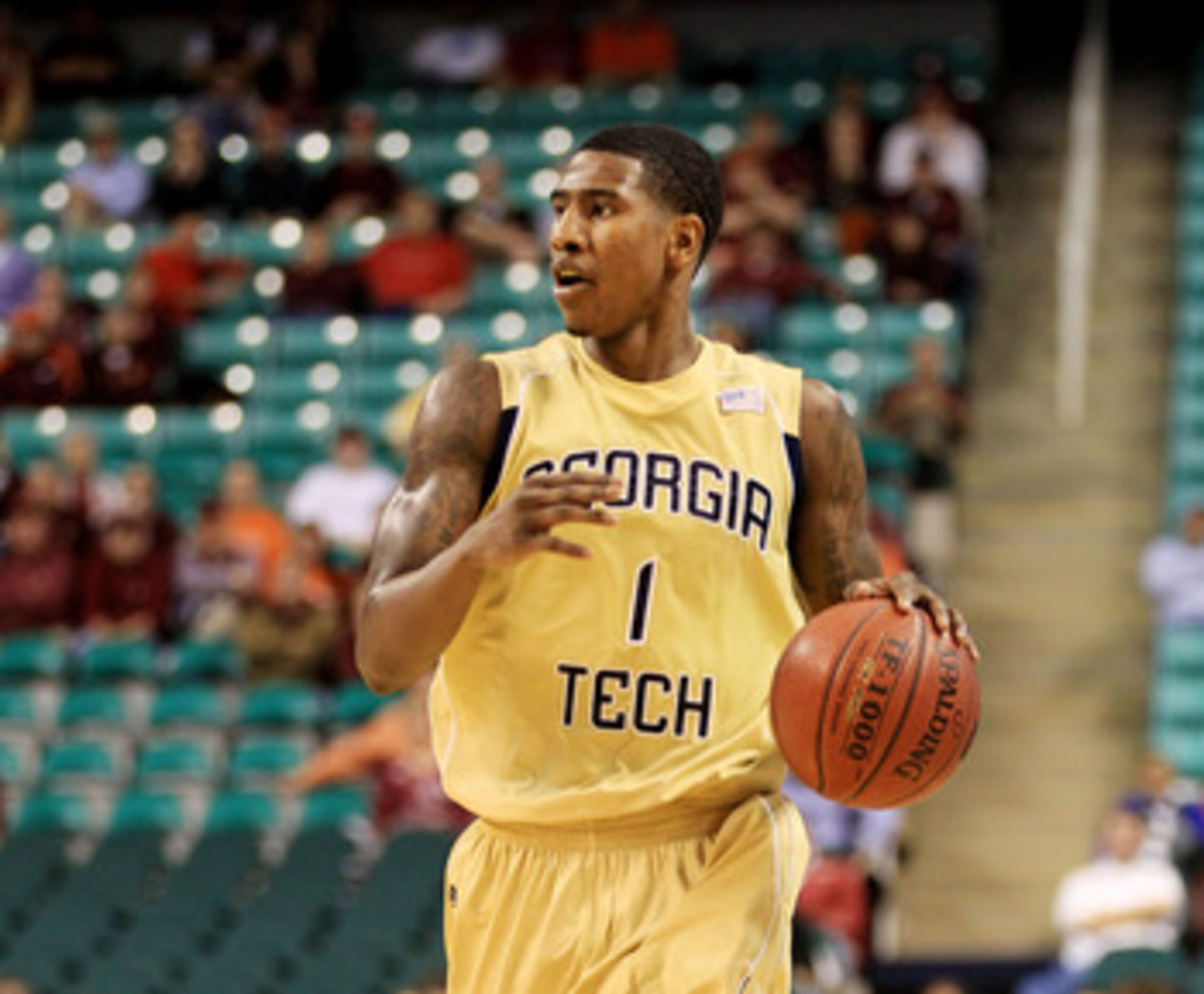 GREENSBORO, NC - MARCH 10:  Iman Shumpert #1 of the Georgia Tech Yellow Jackets dribbles down the court during the second half of the game against the Virginia Tech Hokies in the first round of the 2011 ACC men's basketball tournament at the Greensboro Co