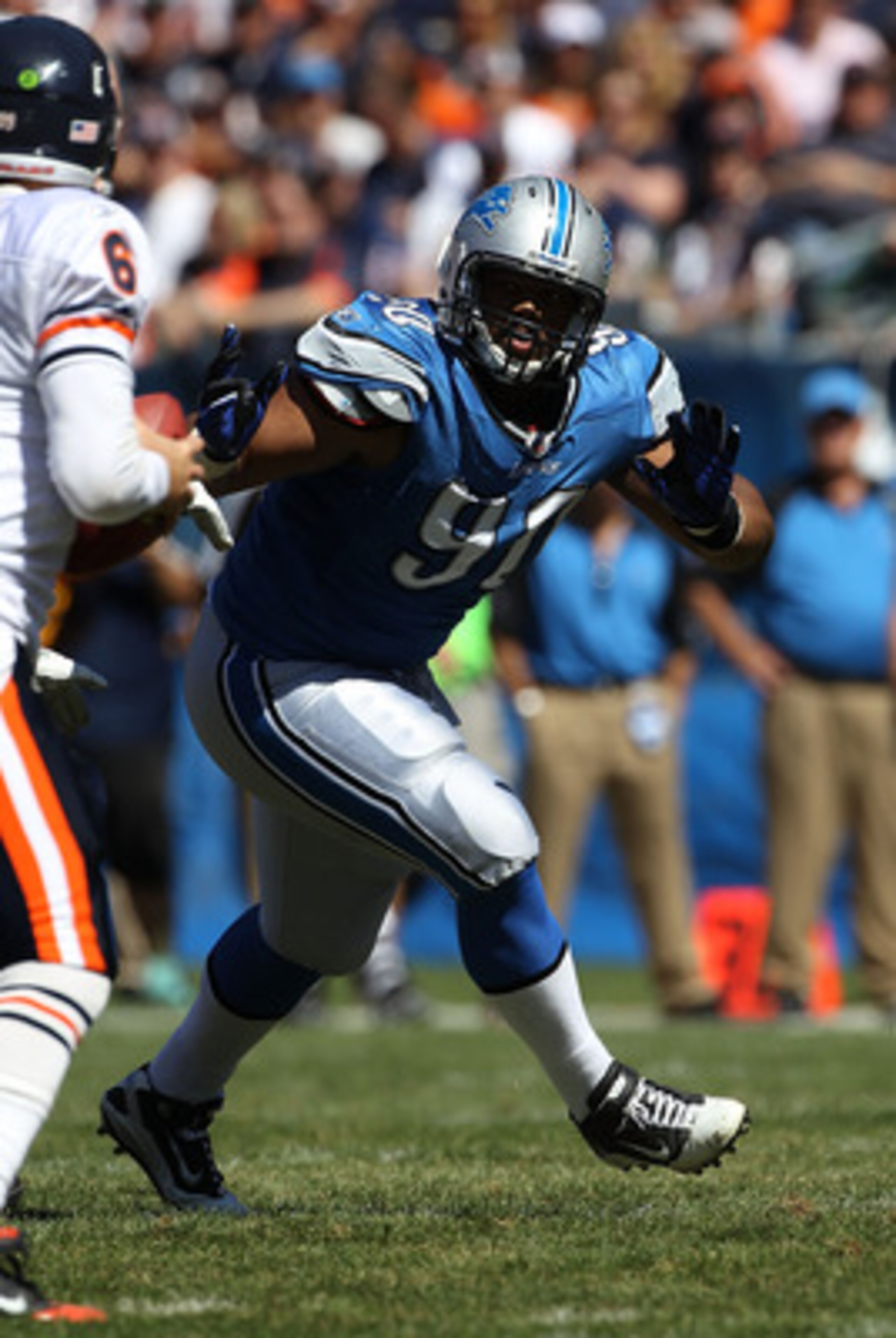 CHICAGO - SEPTEMBER 12: Ndamukong Suh #90 of the Detroit Lions rushes against the Chicago Bears during the NFL season opening game at Soldier Field on September 12, 2010 in Chicago, Illinois. The Bears defeated the Lions 19-14. (Photo by Jonathan Daniel/G