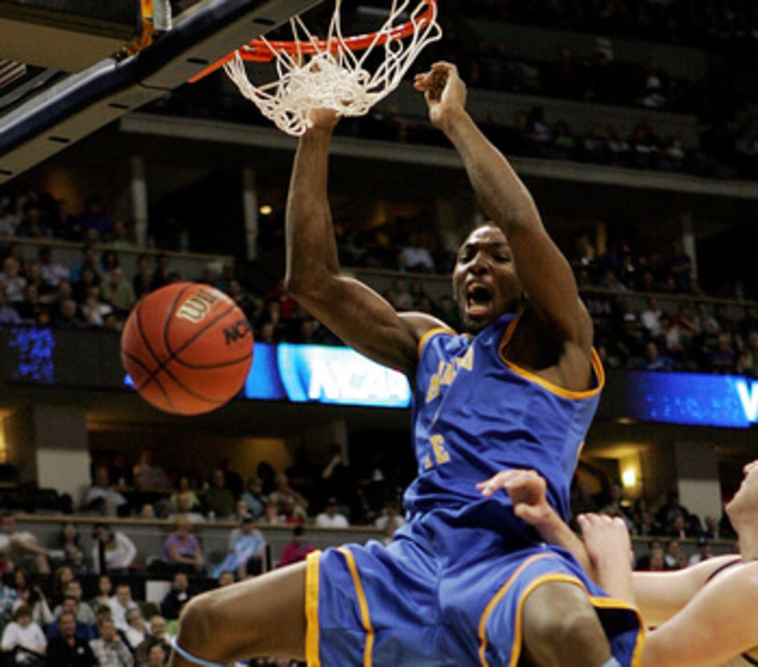 DENVER, CO - MARCH 19:  Kenneth Faried #35 of the Morehead State Eagles dunks the ball against the Richmond Spiders during the third round of the 2011 NCAA men's basketball tournament at Pepsi Center on March 19, 2011 in Denver, Colorado.  (Photo by Justi