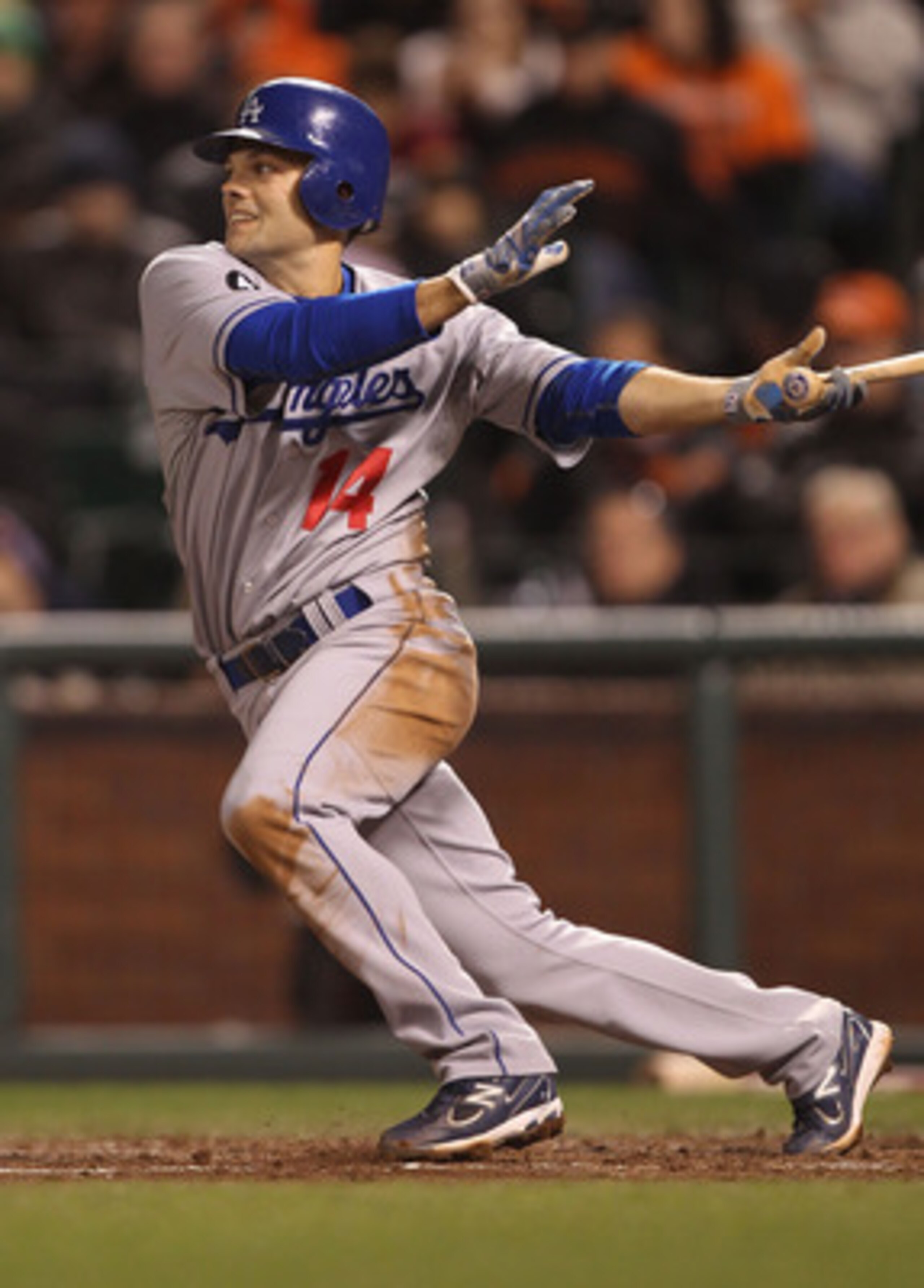 SAN FRANCISCO, CA - APRIL 11:  Jamey Carroll #14 of the Los Angeles Dodgers singles in the fifth inning against the San Francisco Giants during an MLB game at AT&T Park on April 11, 2011 in San Francisco, California.  (Photo by Jed Jacobsohn/Getty Images)