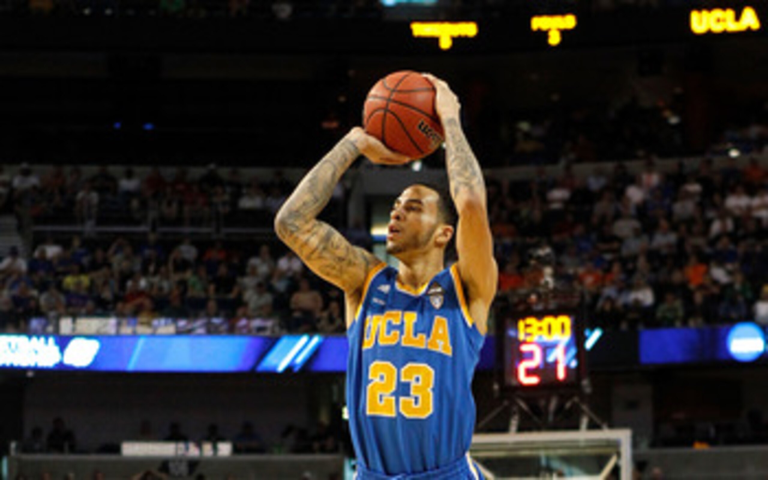 TAMPA, FL - MARCH 19:  Tyler Honeycutt #23 of the UCLA Bruins attempts a shot agaisnt the Florida Gators during the third round of the 2011 NCAA men's basketball tournament at St. Pete Times Forum on March 19, 2011 in Tampa, Florida. Florida won 73-65. (P
