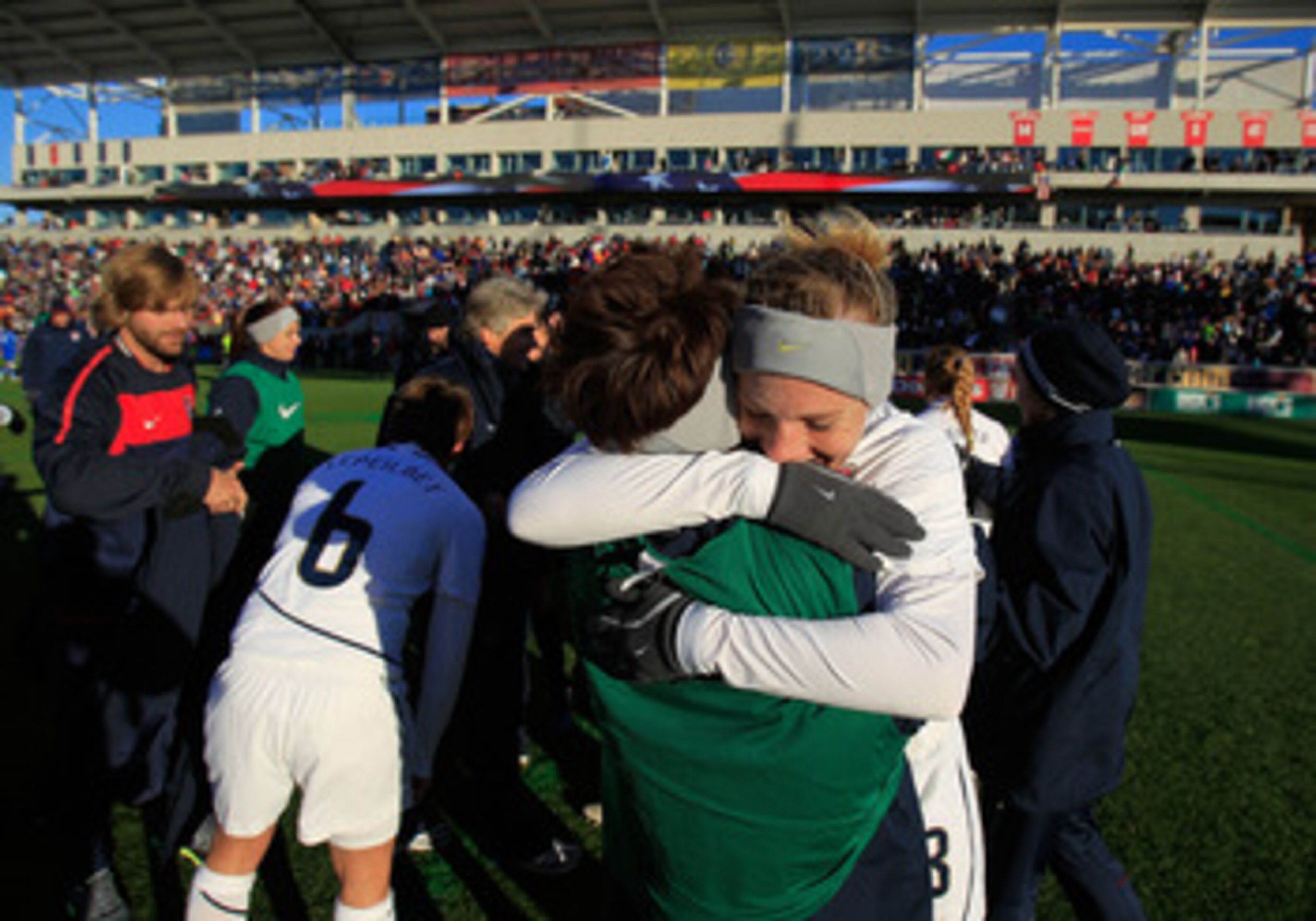 BRIDGEVIEW, IL - NOVEMBER 27: Amy Rodriguez #8 of the United States gets a hug from a teammate after scoring the only goal of the match against Italy during a Women's World Cup Qualifying match at Toyota Park on November 27, 2010 in Bridgeview, Illinois. BRIDGEVIEW, IL - NOVEMBER 27: Amy Rodriguez #8 of the United States gets a hug from a teammate after scoring the only goal of the match against Italy during a Women's World Cup Qualifying match at Toyota Park on November 27, 2010 in Bridgeview, Illinois.