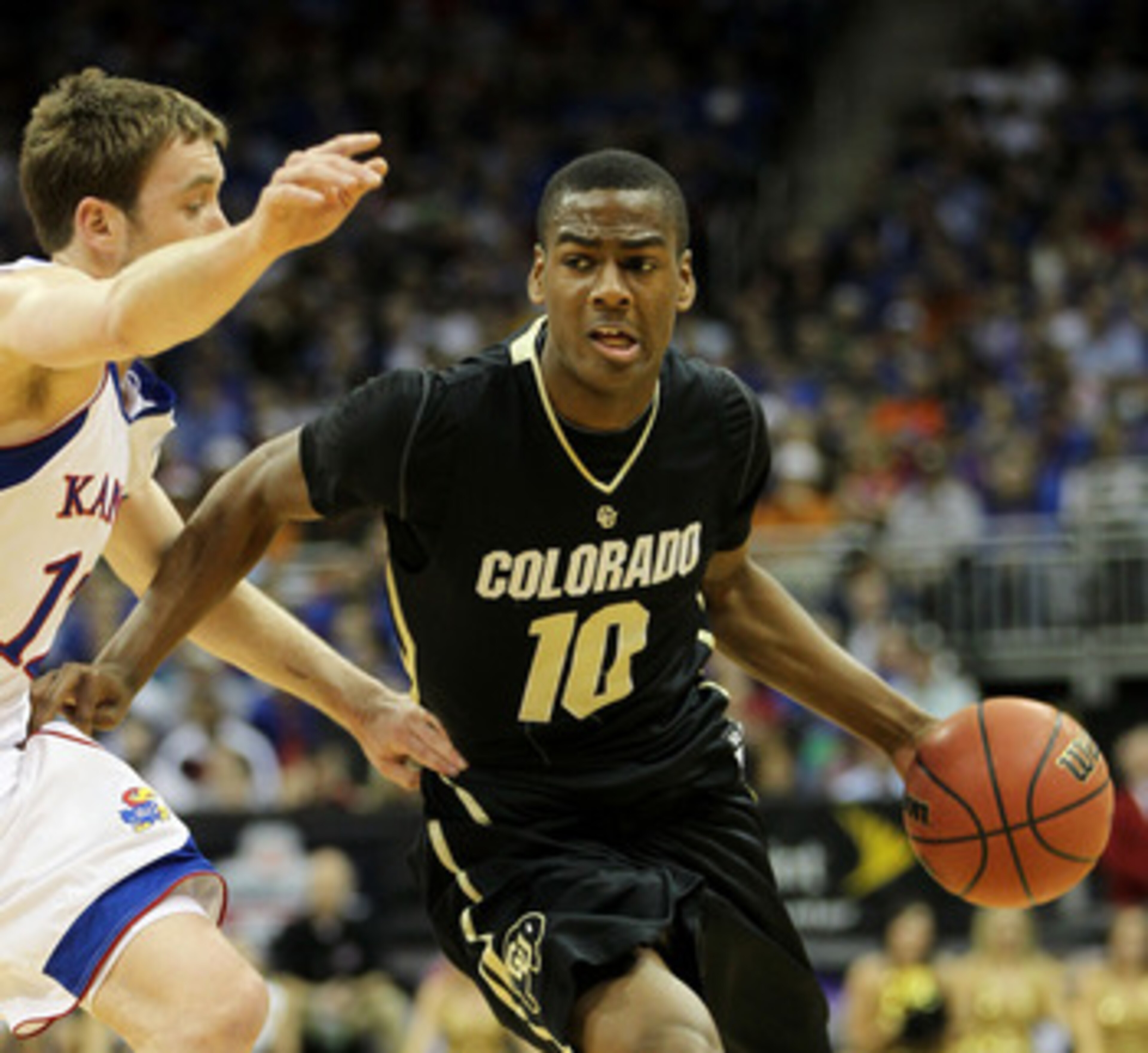 KANSAS CITY, MO - MARCH 11:  Alec Burks #10 of the Colorado Buffaloes drives with the ball against the Kansas Jayhawks during their semifinal game in the 2011 Phillips 66 Big 12 Men's Basketball Tournament at Sprint Center on March 11, 2011 in Kansas City
