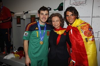 JOHANNESBURG, SOUTH AFRICA - JULY 11: Spain´s goalkeeper Iker Casillas (L-R), Spanish Queen Sofia and tennis player Rafa Nadal celebrates the victory in the Spanish dressing room after Spanish football tam won the 2010 FIFA World Cup at Soccer City Stadiu