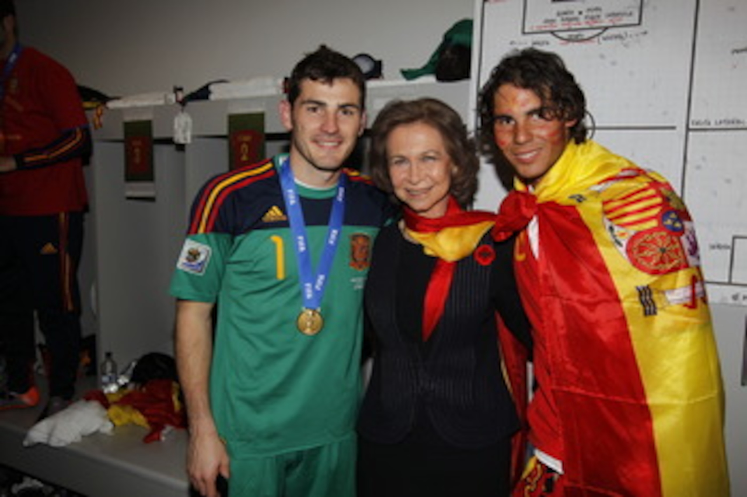 JOHANNESBURG, SOUTH AFRICA - JULY 11: Spain´s goalkeeper Iker Casillas (L-R), Spanish Queen Sofia and tennis player Rafa Nadal celebrates the victory in the Spanish dressing room after Spanish football tam won the 2010 FIFA World Cup at Soccer City Stadiu