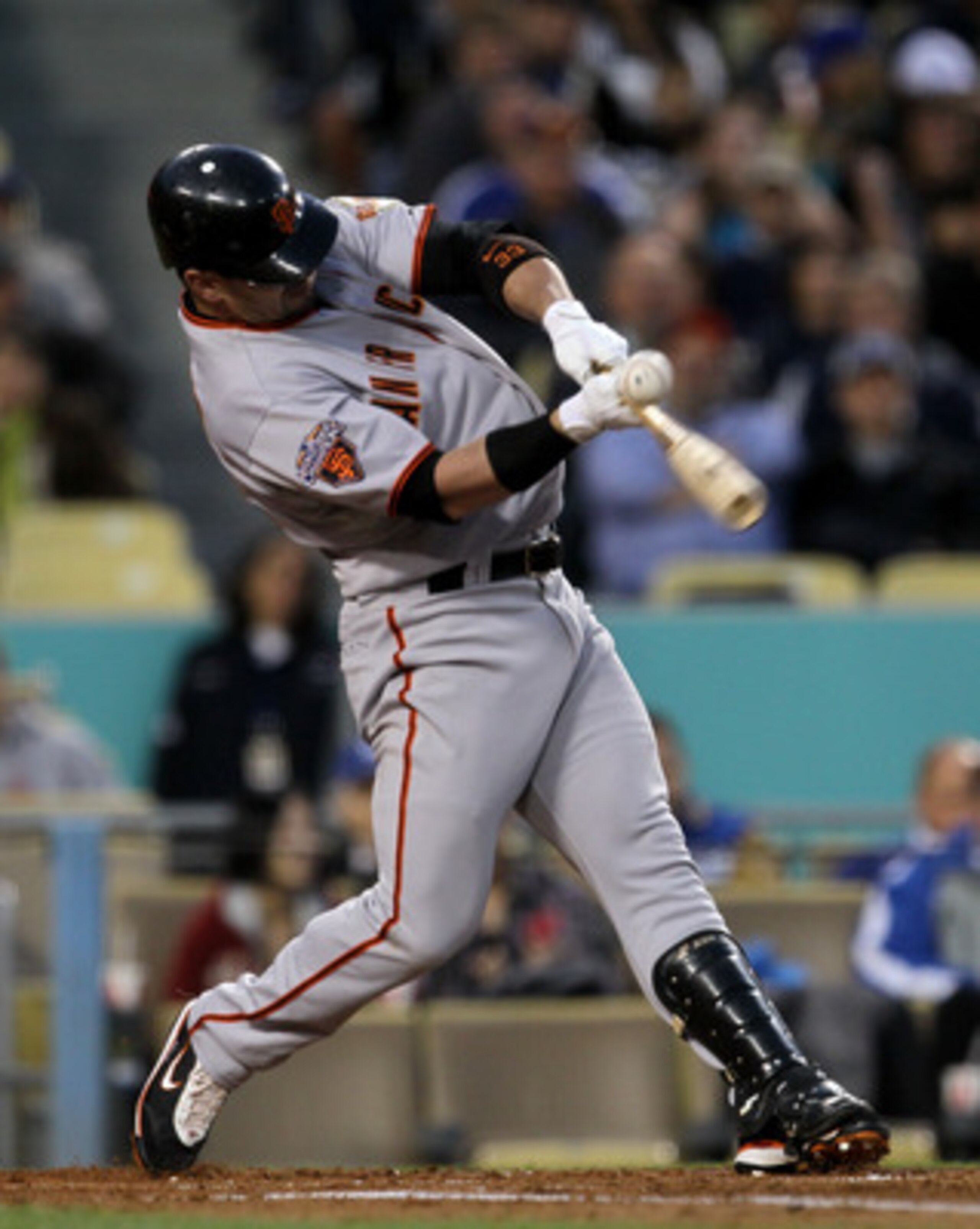 LOS ANGELES, CA - MAY 18:  Aaron Rowland #33 of the San Francisco Giants hits a single in the third inning against the Los Angeles Dodgers on May 18, 2011 at Dodger Stadium in Los Angeles, California.  (Photo by Stephen Dunn/Getty Images)