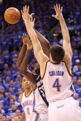 OKLAHOMA CITY, OK - MAY 03:  Zach Randolph #50 of the Memphis Grizzlies goes up for a shot over Nick Collison #4 of the Oklahoma City Thunder in the first quarter of Game Two of the Western Conference Semifinals in the 2011 NBA Playoffs on May 3, 2011 at 