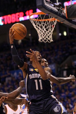 OKLAHOMA CITY, OK - MAY 15:  Guard Mike Conley #11 of the Memphis Grizzlies drives the lane against the Oklahoma City Thunder in Game Seven of the Western Conference Semifinals in the 2011 NBA Playoffs on May 15, 2011 at Oklahoma City Arena in Oklahoma Ci