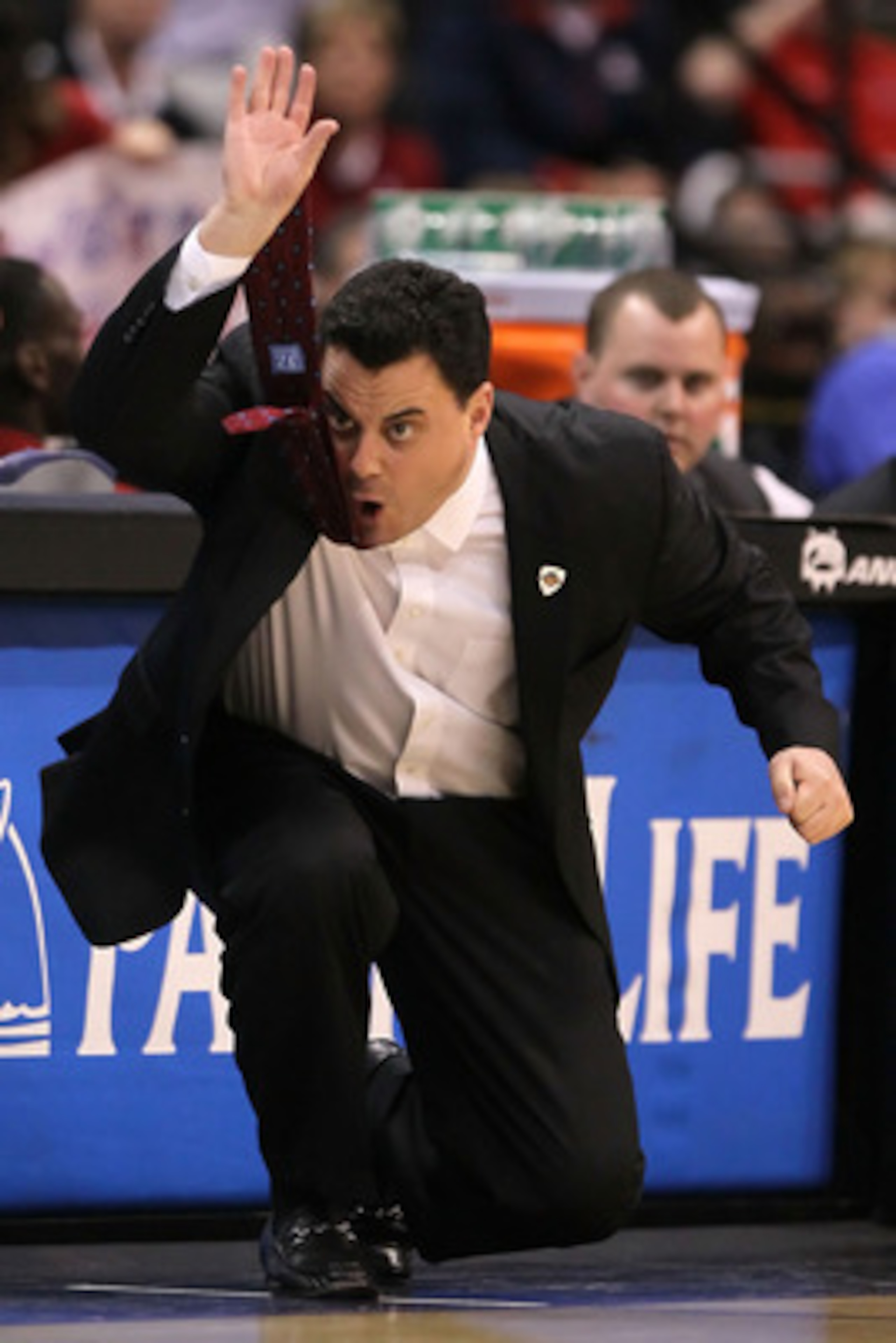 LOS ANGELES, CA - MARCH 12: Head coach Sean Miller of the Arizona Wildcats reacts in the first half while taking on the Washington Huskies in the championship game of the 2011 Pacific Life Pac-10 Men's Basketball Tournament at Staples Center on March 12, LOS ANGELES, CA - MARCH 12: Head coach Sean Miller of the Arizona Wildcats reacts in the first half while taking on the Washington Huskies in the championship game of the 2011 Pacific Life Pac-10 Men's Basketball Tournament at Staples Center on March 12,