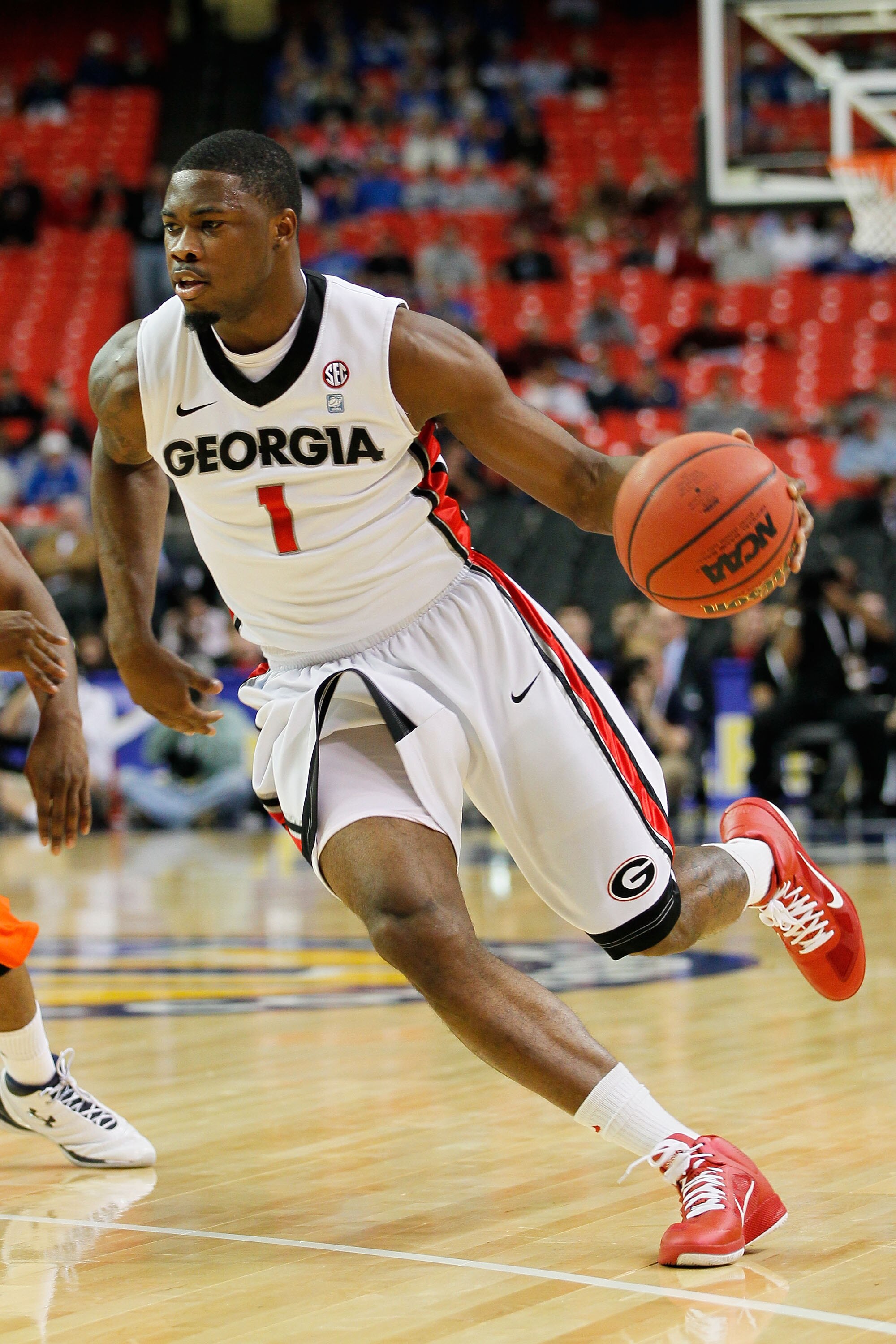 ATLANTA, GA - MARCH 10:  Travis Leslie #1 of the Georgia Bulldogs drives against the Auburn Tigers during the the first round of the SEC Men's Basketball Tournament at the Georgia Dome on March 10, 2011 in Atlanta, Georgia.  (Photo by Kevin C. Cox/Getty I
