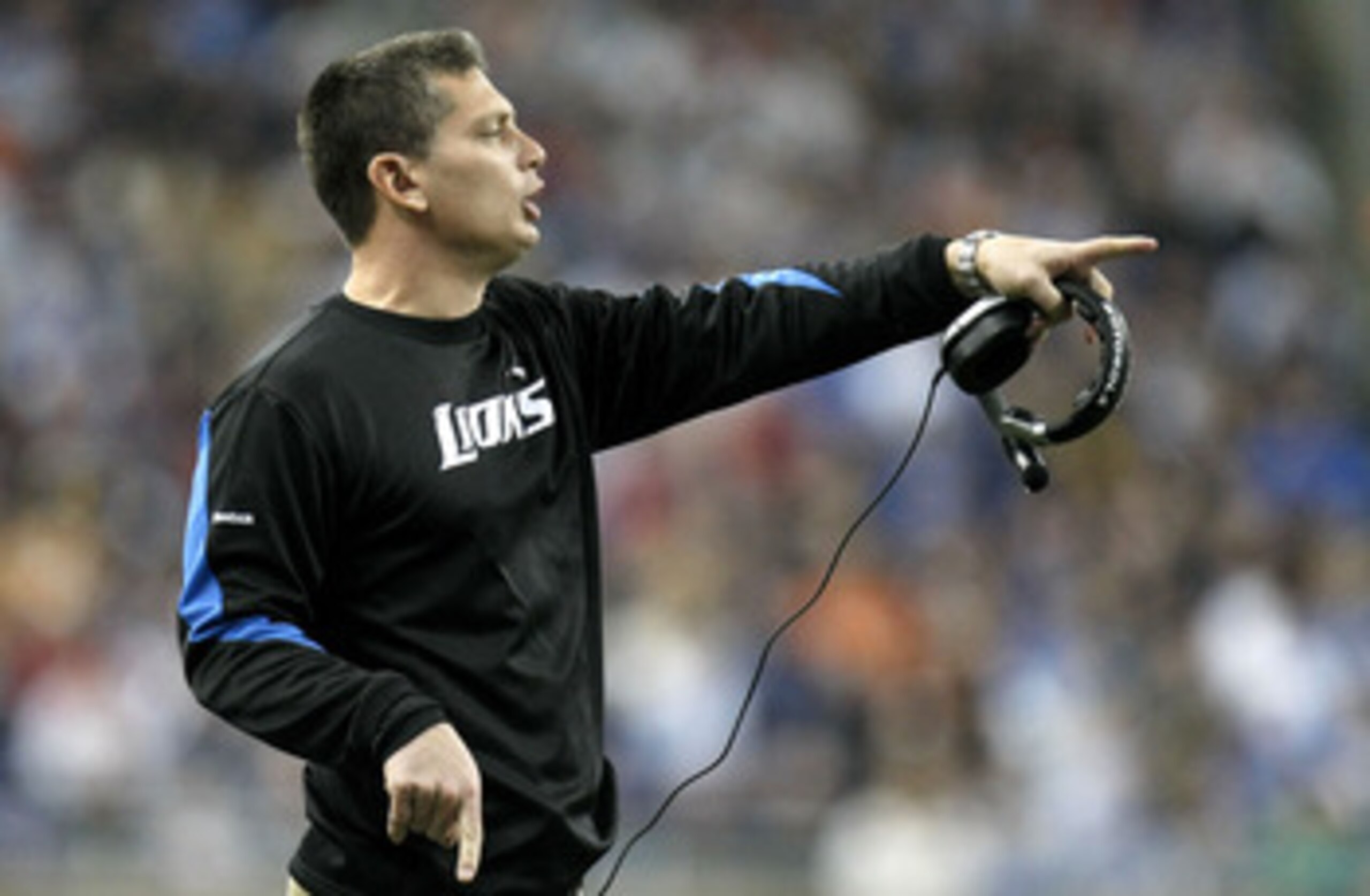 DETROIT - JANUARY 03:  Head coach Jim Schwartz of the Detroit Lions points out something from the sideline while playing the Chicago Bears on January 3, 2010 at Ford Field in Detroit, Michigan. Chicago won the game 23-37.  (Photo by Gregory Shamus/Getty I