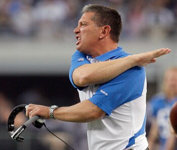 ARLINGTON, TX - NOVEMBER 21:  Head coach Jim Schwartz of the Detroit Lions reacts to a call from the officials while taking on the Dallas Cowboys at Cowboys Stadium on November 21, 2010 in Arlington, Texas.  The Cowboys beat the Lions 35-19.  (Photo by To