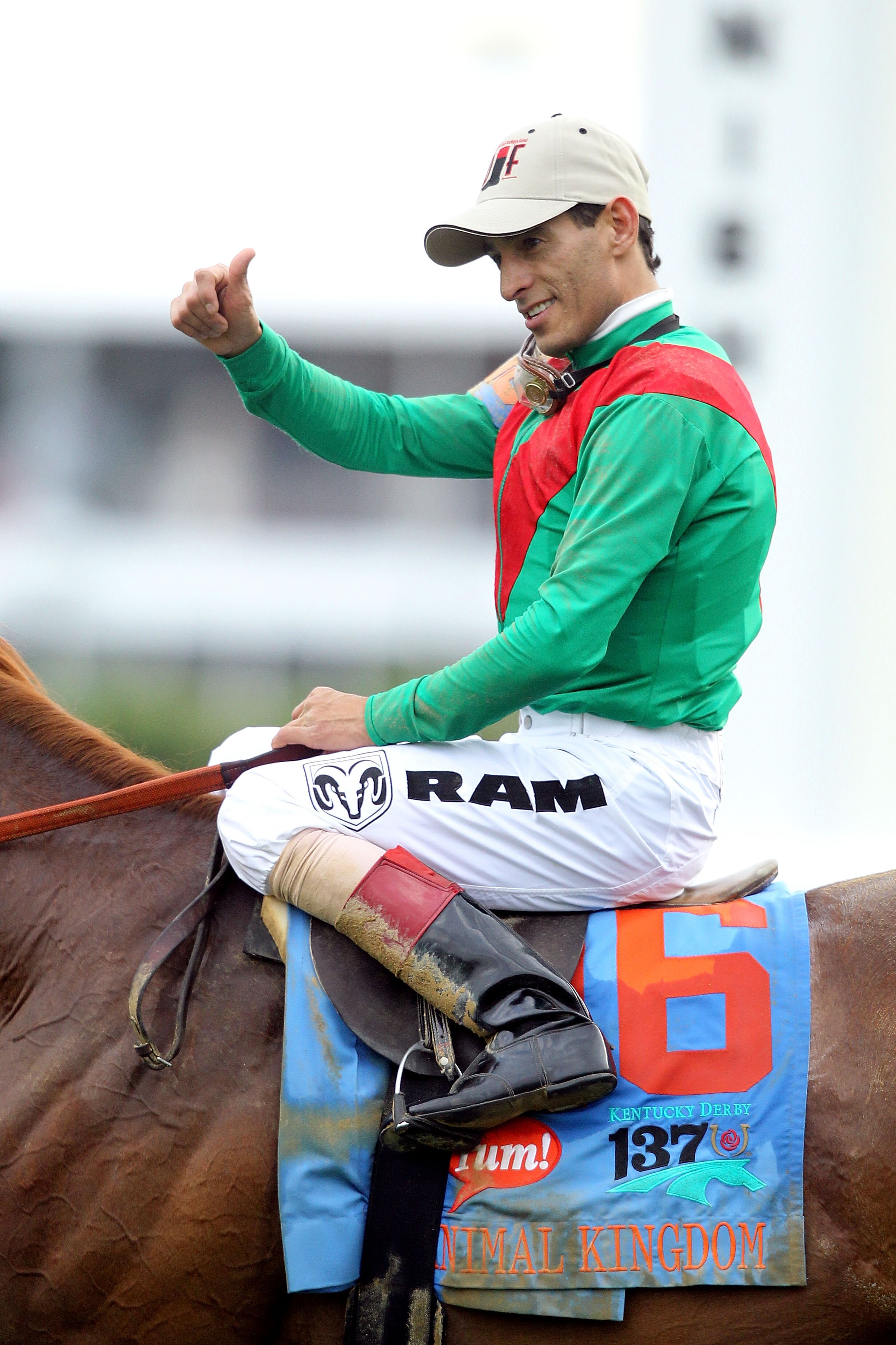 LOUISVILLE, KY - MAY 07:  Jockey John Velazquez, riding Animal Kingdom #16, celebrates winning the 137th Kentucky Derby at Churchill Downs on May 7, 2011 in Louisville, Kentucky.  (Photo by Matthew Stockman/Getty Images)