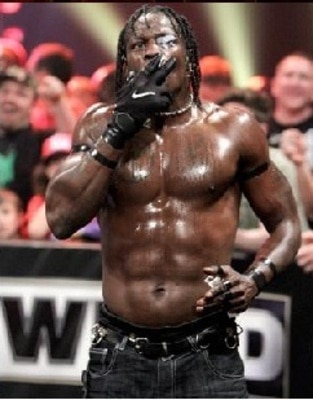 R-Truth lighting up a cigarette...