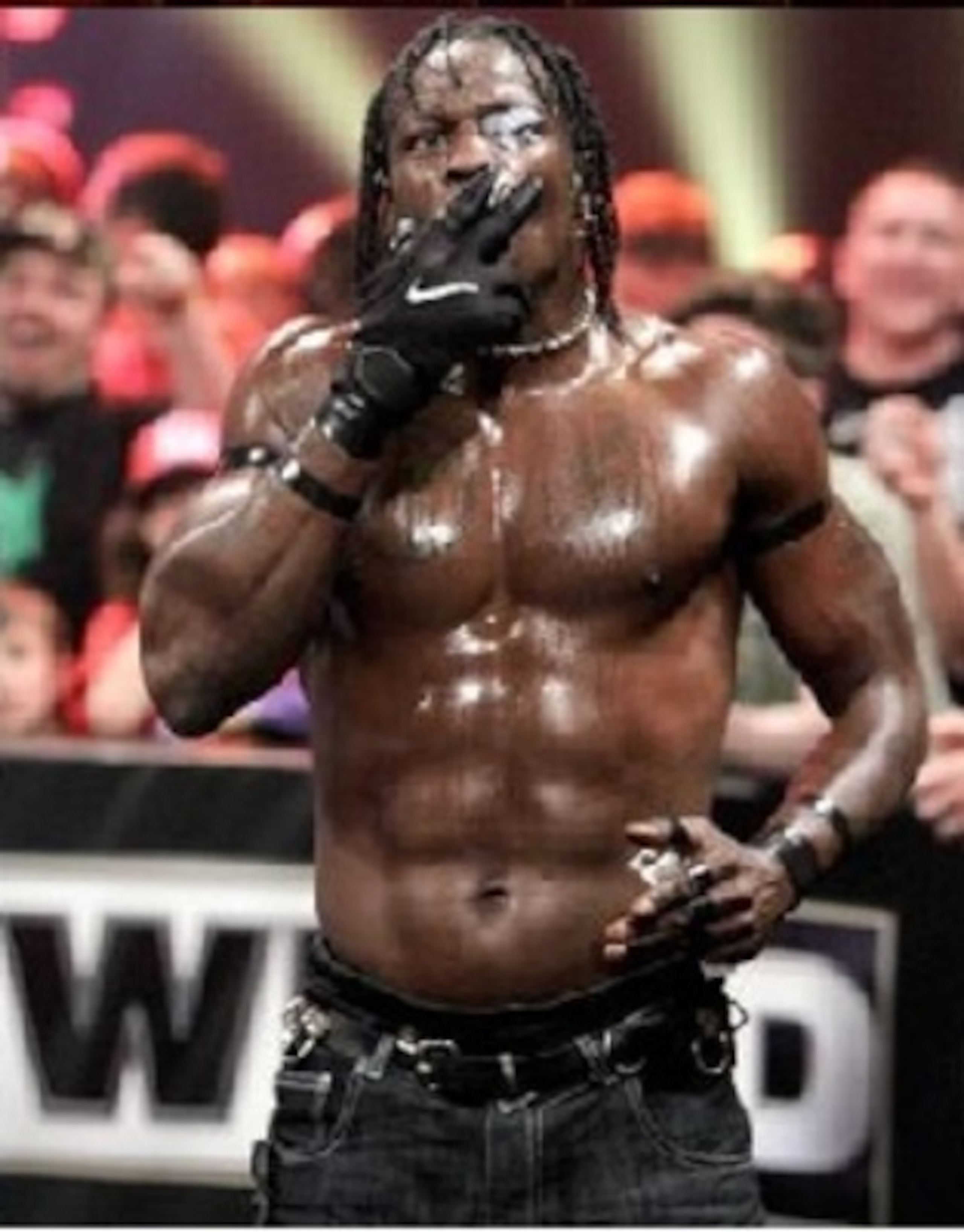 R-Truth lighting up a cigarette...