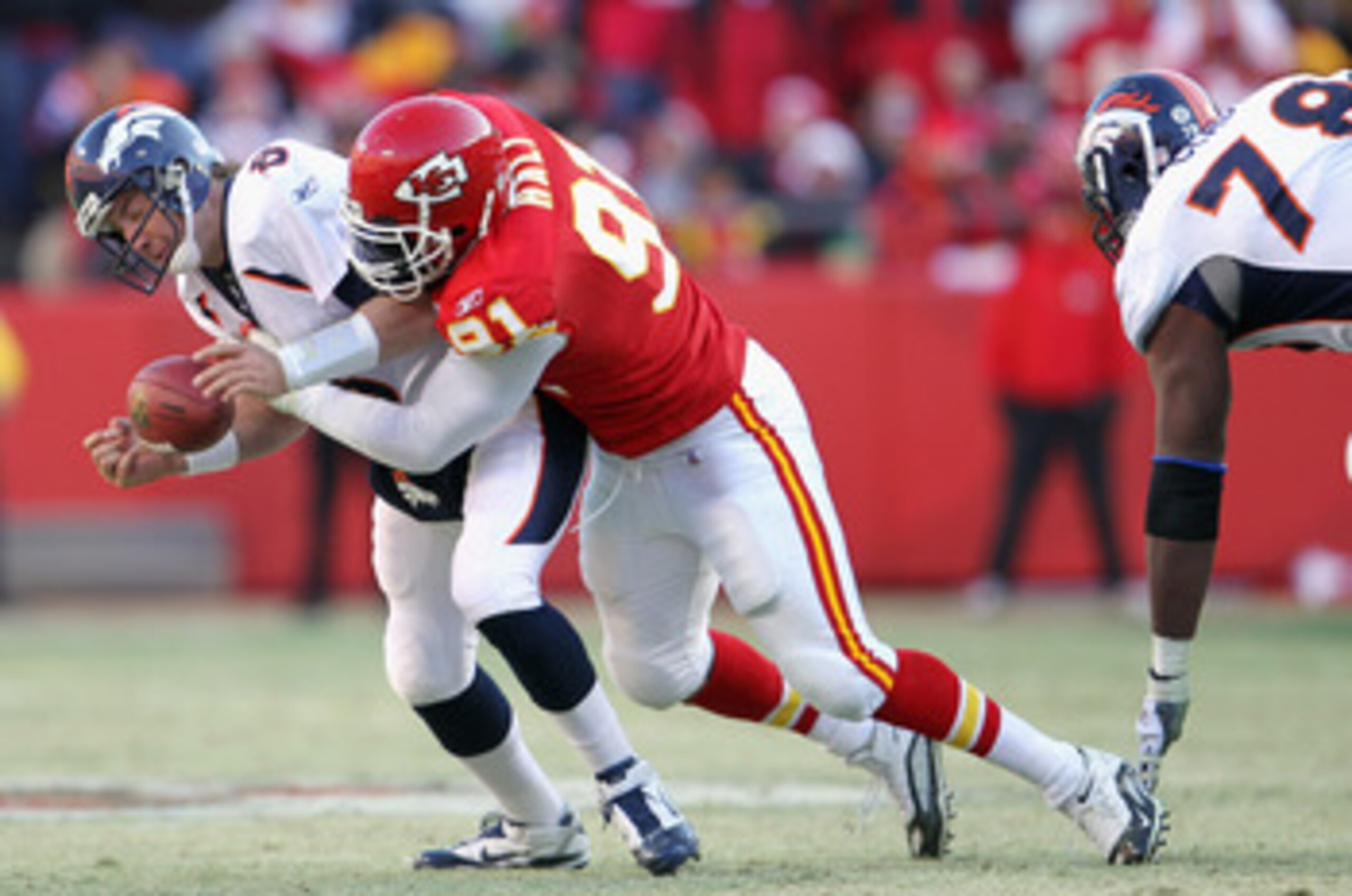 KANSAS CITY, MO - DECEMBER 05:  Tamba Hali #91 of the Kansas City Chiefs sacks quarterback Kyle Orton #8 of the Denver Broncos during the game on December 5, 2010 at Arrowhead Stadium in Kansas City, Missouri.  (Photo by Jamie Squire/Getty Images)