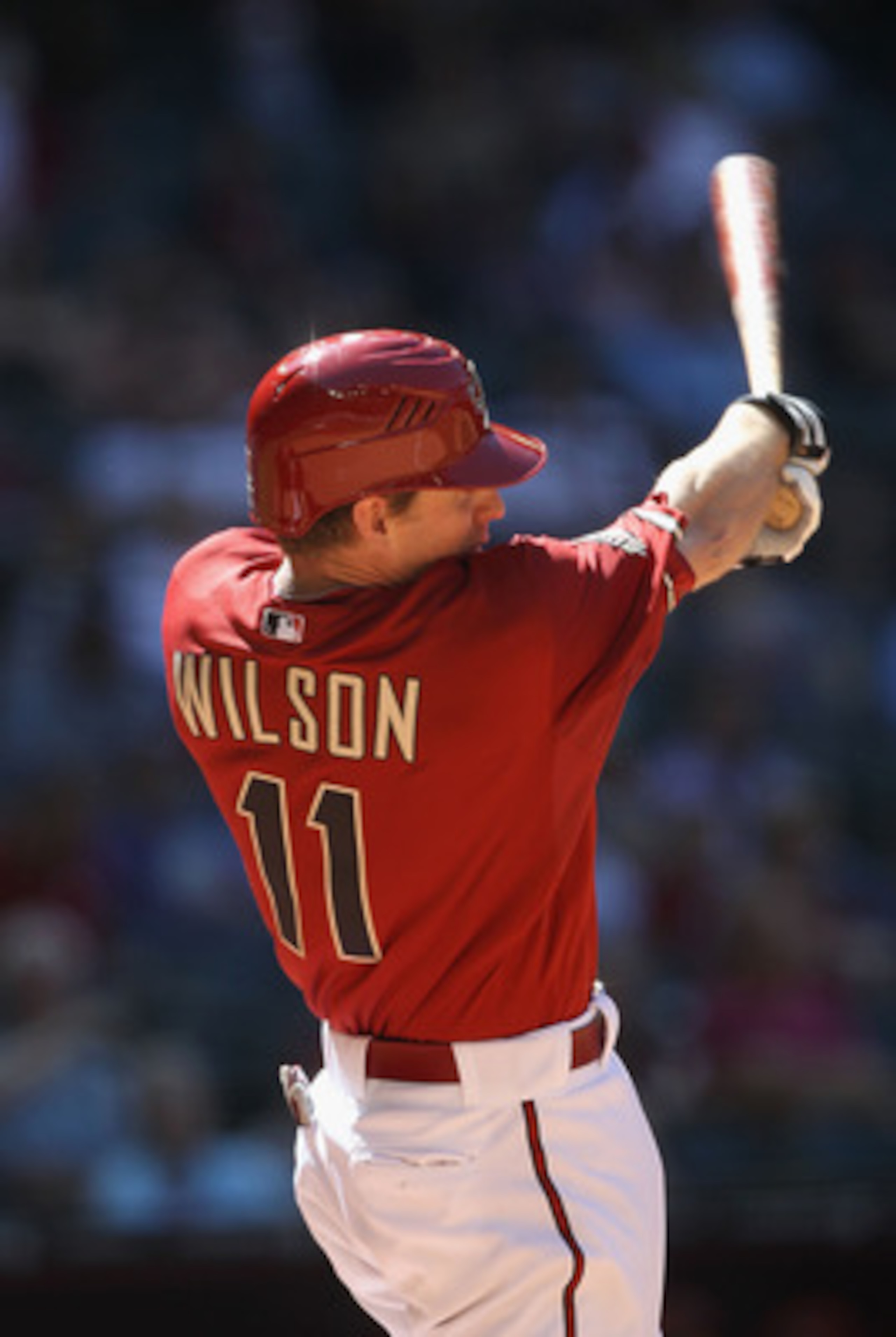 PHOENIX, AZ - APRIL 27:  Josh Wilson #11 of the Arizona Diamondbacks bats against the Philadelphia Phillies during the Major League Baseball game at Chase Field on April 27, 2011 in Phoenix, Arizona. The Phillies defeated the Diamondbacks 8-4.  (Photo by 
