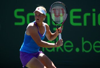 KEY BISCAYNE, FL - MARCH 24:  Melanie Oudin gets set for a return against Daniela Hantuchova of Slovakia during the Sony Ericsson Open at Crandon Park Tennis Center on March 24, 2011 in Key Biscayne, Florida.  (Photo by Clive Brunskill/Getty Images)