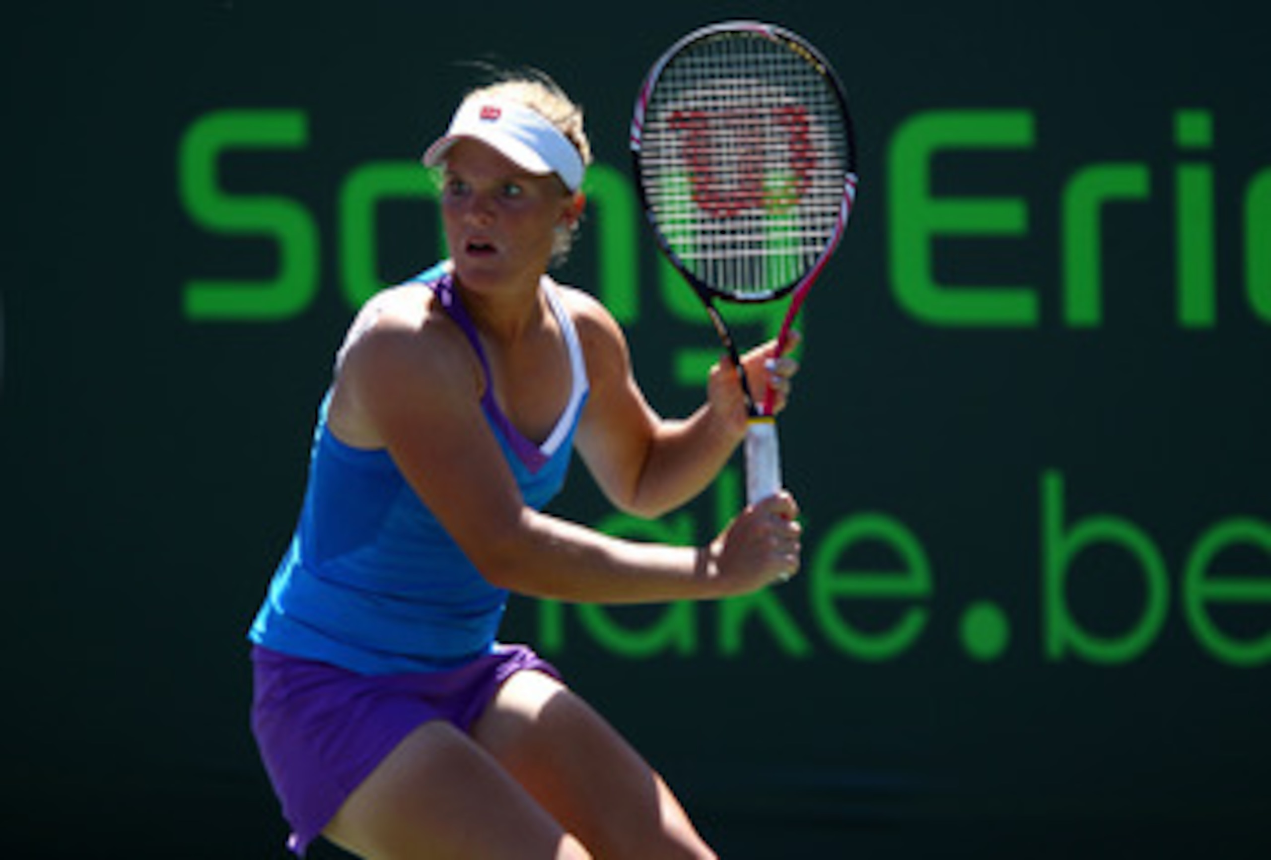 KEY BISCAYNE, FL - MARCH 24:  Melanie Oudin gets set for a return against Daniela Hantuchova of Slovakia during the Sony Ericsson Open at Crandon Park Tennis Center on March 24, 2011 in Key Biscayne, Florida.  (Photo by Clive Brunskill/Getty Images)