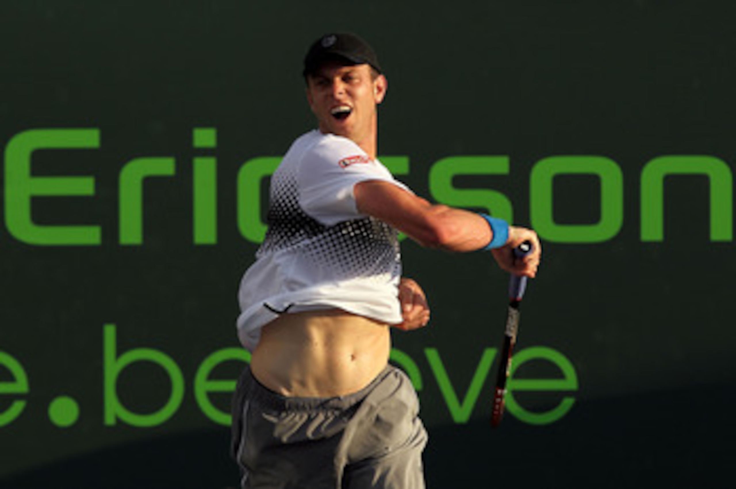 KEY BISCAYNE, FL - MARCH 25:  Sam Querrey follows through on a return against Mikhail Kukushkin of Kazakhstan during the Sony Ericsson Open at Crandon Park Tennis Center on March 25, 2011 in Key Biscayne, Florida.  (Photo by Al Bello/Getty Images)