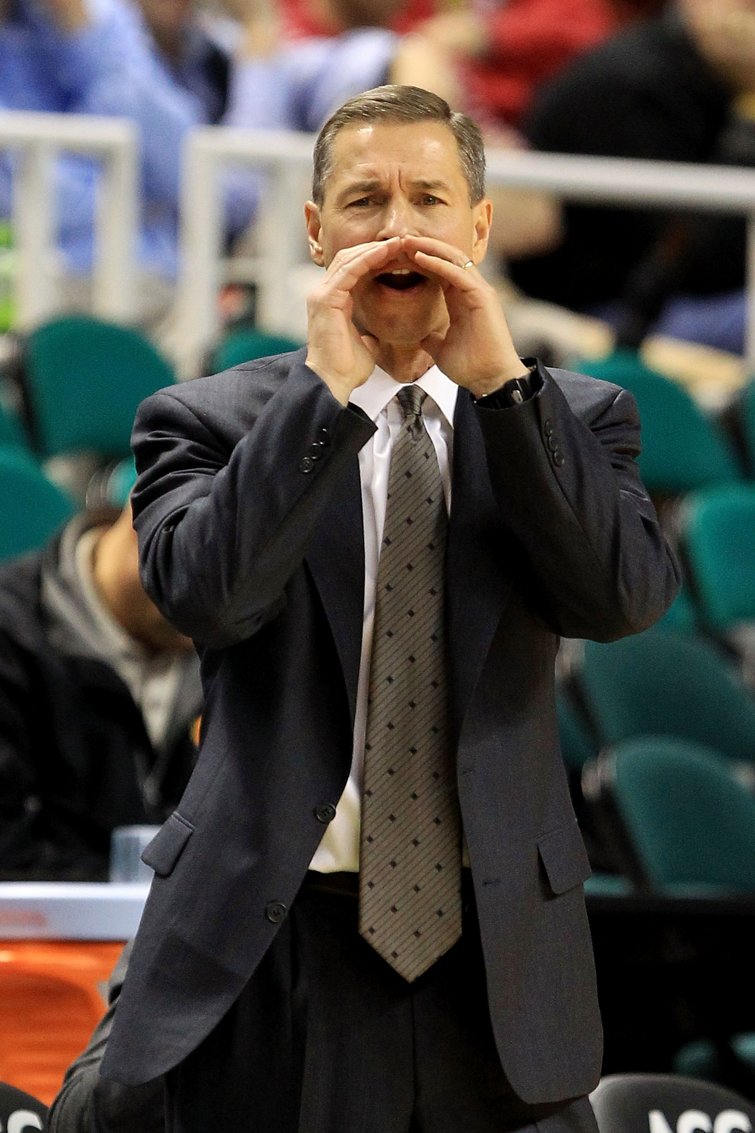 GREENSBORO, NC - MARCH 10:  Head coach Jeff Bzdelik of the Wake Forest Demon Deacons communicates with the team while playing against the Boston College Eagles during the first round of the 2011 ACC men's basketball tournament at the Greensboro Coliseum o