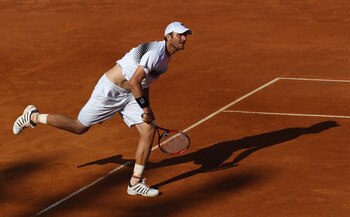 ROME, ITALY - MAY 09:  Mardy Fish of the USA serves during his first round match against Santiago Giraldo of Columbia during day two of the Internazoinali BNL D'Italia at the Foro Italico Tennis Centre on May 9, 2011 in Rome, Italy.  (Photo by Clive Bruns