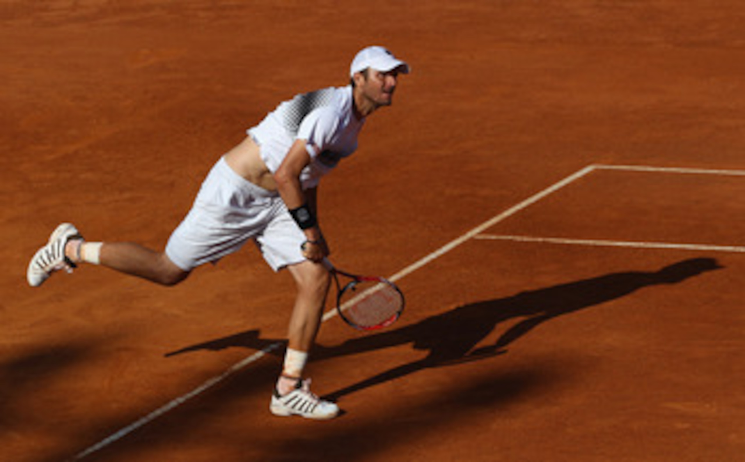 ROME, ITALY - MAY 09:  Mardy Fish of the USA serves during his first round match against Santiago Giraldo of Columbia during day two of the Internazoinali BNL D'Italia at the Foro Italico Tennis Centre on May 9, 2011 in Rome, Italy.  (Photo by Clive Bruns